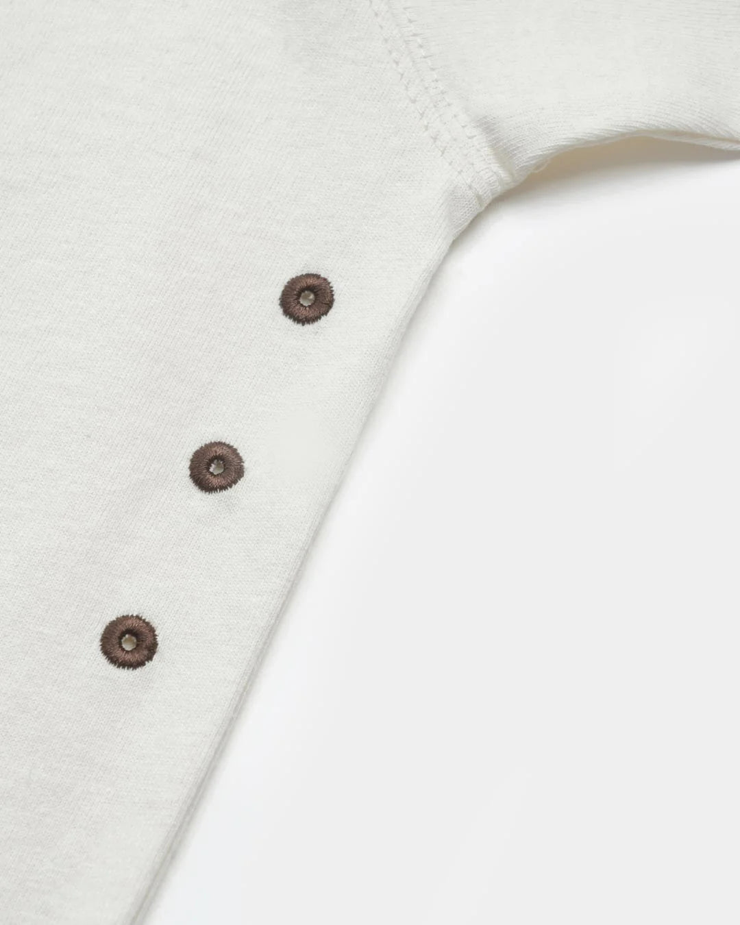 A Eckhaus Latta Shirt pictured on a model in front of a white background. The title of the product is Eckhaus Latta Eclipse Turtleneck - Stone and the image was taken by 199A®.