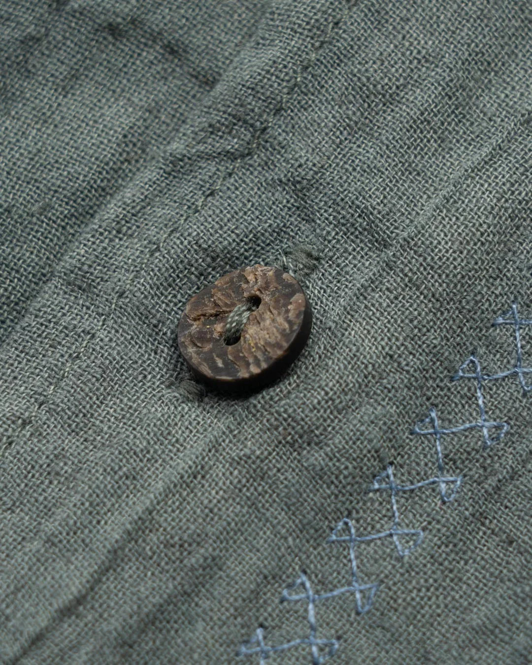 A Eckhaus Latta Shirt pictured on a model in front of a white background. The title of the product is Eckhaus Latta Eclipse Turtleneck - Stone and the image was taken by 199A®.