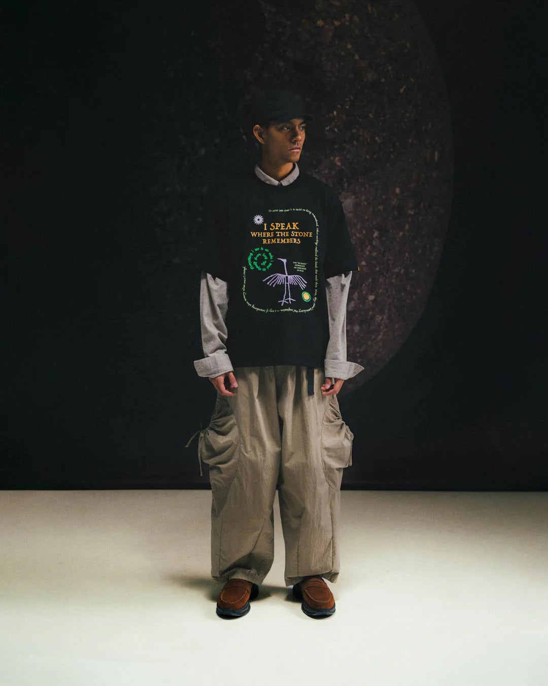 A Eckhaus Latta Shirt pictured on a model in front of a white background. The title of the product is Eckhaus Latta Eclipse Turtleneck - Stone and the image was taken by 199A®.