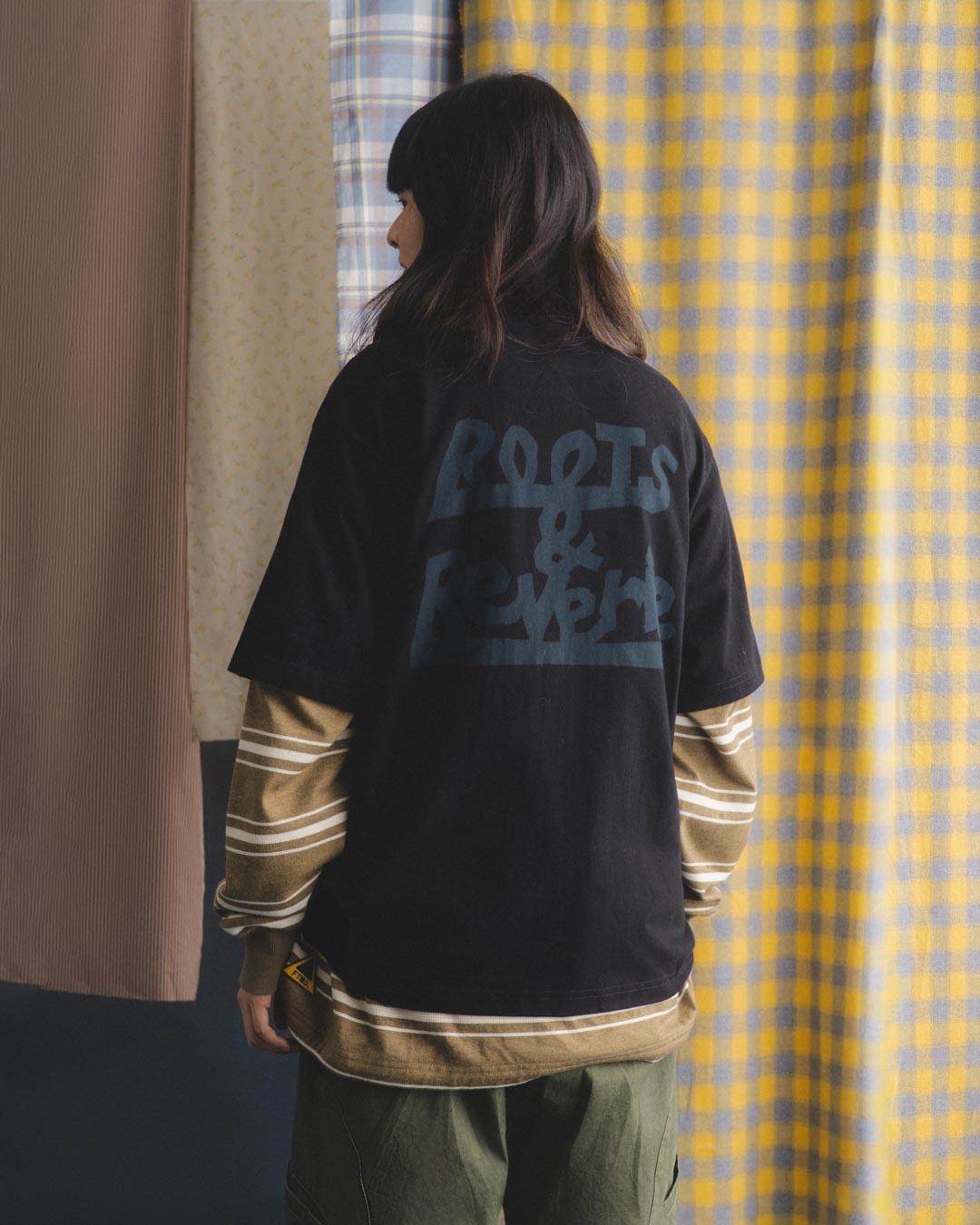 A Eckhaus Latta Shirt pictured on a model in front of a white background. The title of the product is Eckhaus Latta Eclipse Turtleneck - Stone and the image was taken by 199A®.