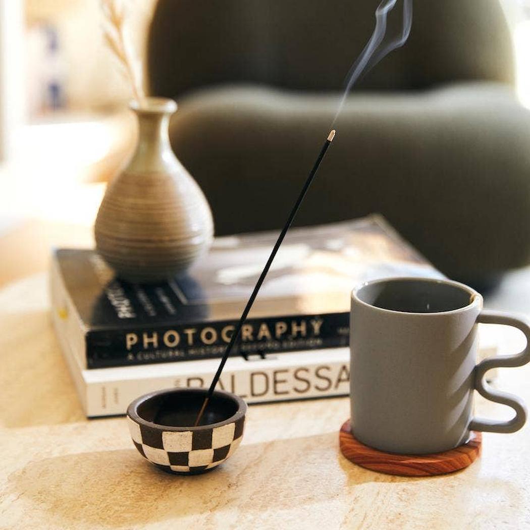 A Eckhaus Latta Shirt pictured on a model in front of a white background. The title of the product is Eckhaus Latta Eclipse Turtleneck - Stone and the image was taken by 199A®.