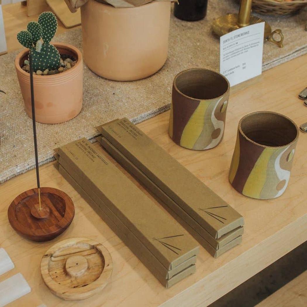 A Eckhaus Latta Shirt pictured on a model in front of a white background. The title of the product is Eckhaus Latta Eclipse Turtleneck - Stone and the image was taken by 199A®.