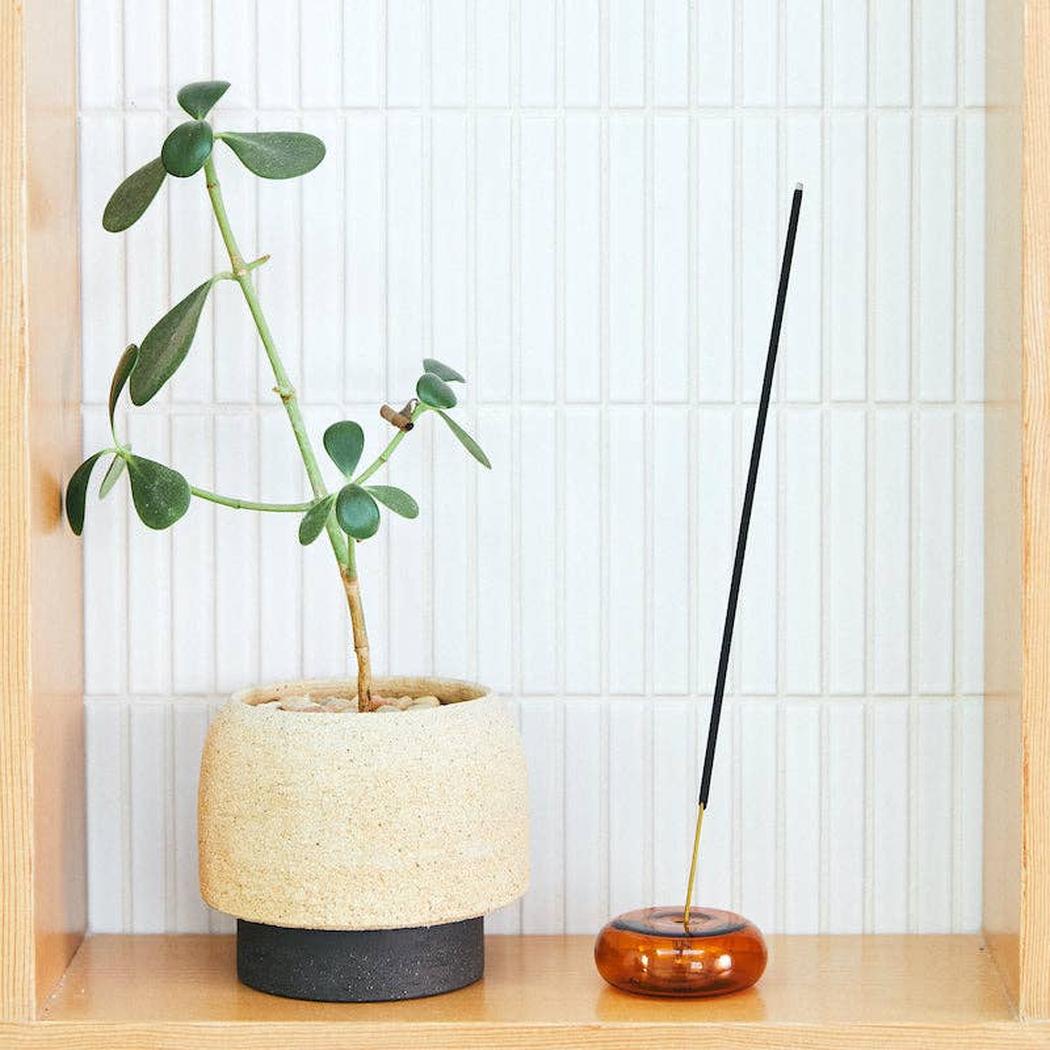 A Eckhaus Latta Shirt pictured on a model in front of a white background. The title of the product is Eckhaus Latta Eclipse Turtleneck - Stone and the image was taken by 199A®.