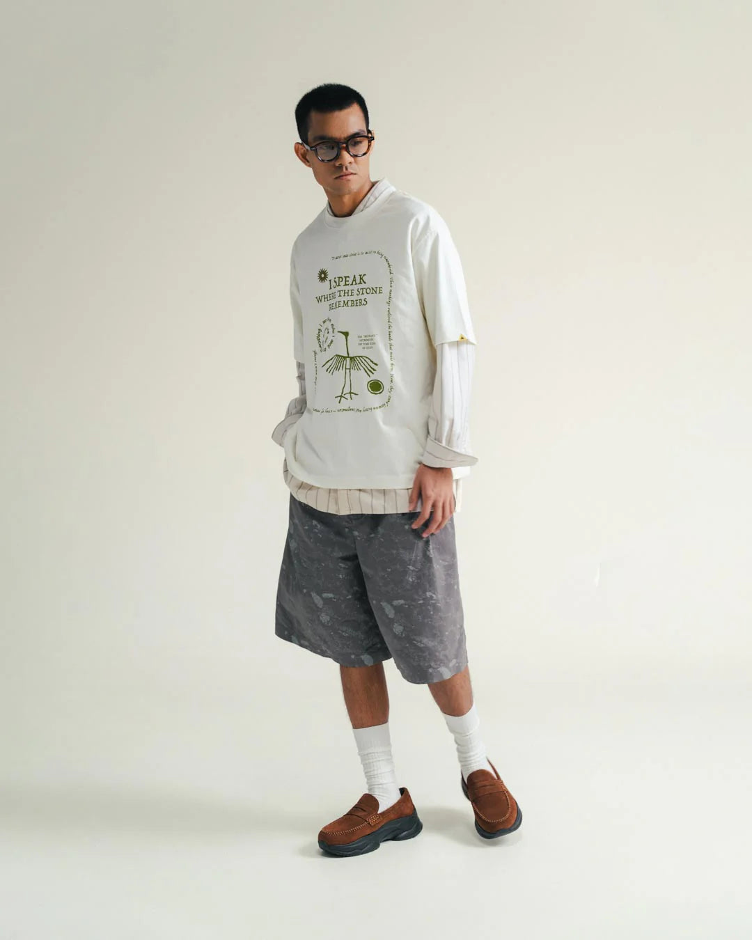 A Eckhaus Latta Shirt pictured on a model in front of a white background. The title of the product is Eckhaus Latta Eclipse Turtleneck - Stone and the image was taken by 199A®.
