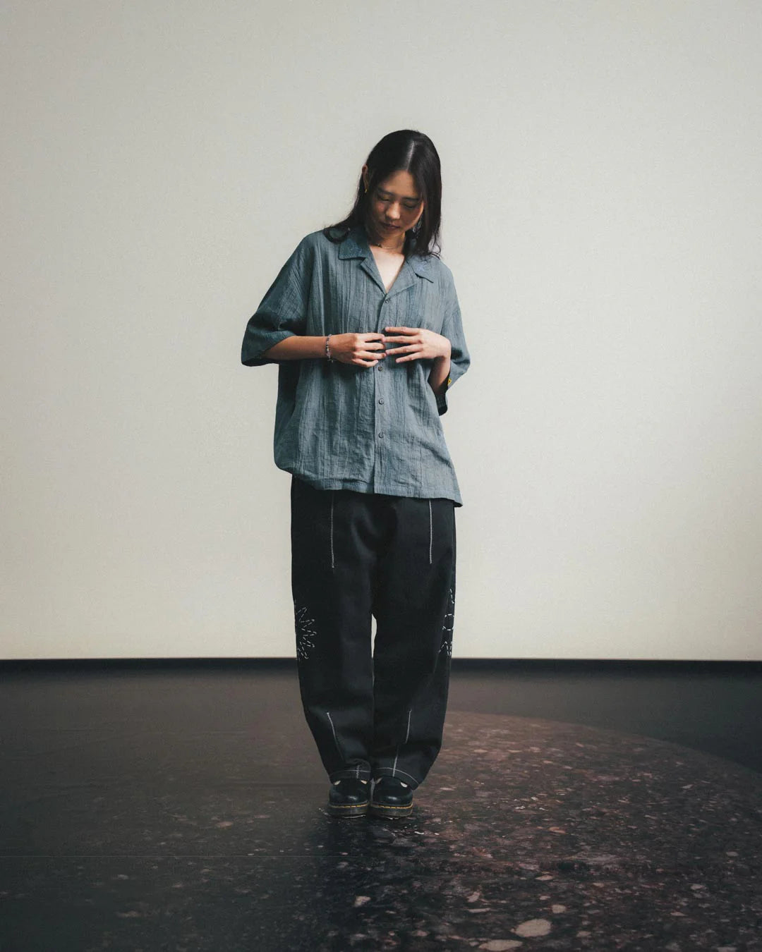A Eckhaus Latta Shirt pictured on a model in front of a white background. The title of the product is Eckhaus Latta Eclipse Turtleneck - Stone and the image was taken by 199A®.