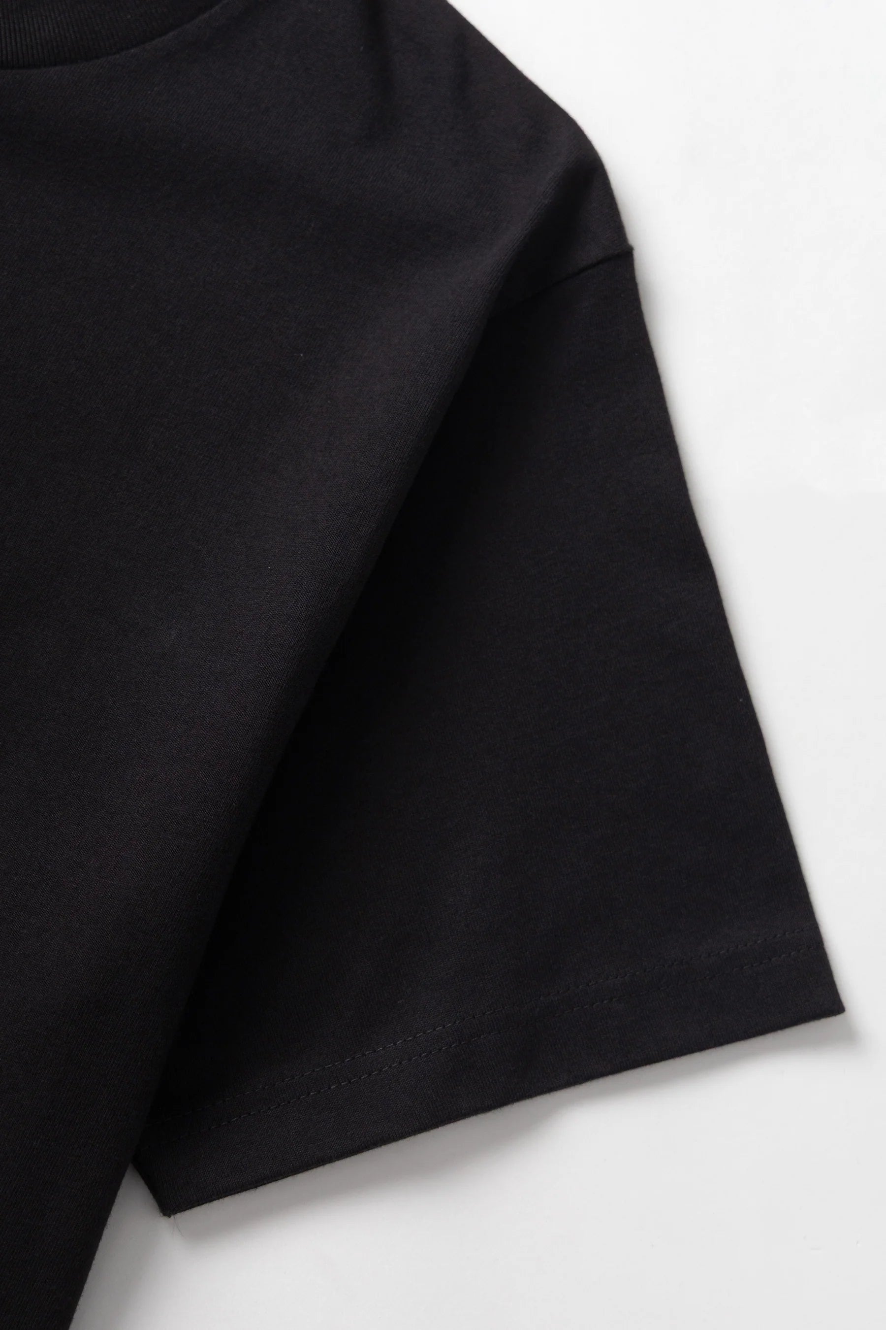 A Eckhaus Latta Shirt pictured on a model in front of a white background. The title of the product is Eckhaus Latta Eclipse Turtleneck - Stone and the image was taken by 199A®.