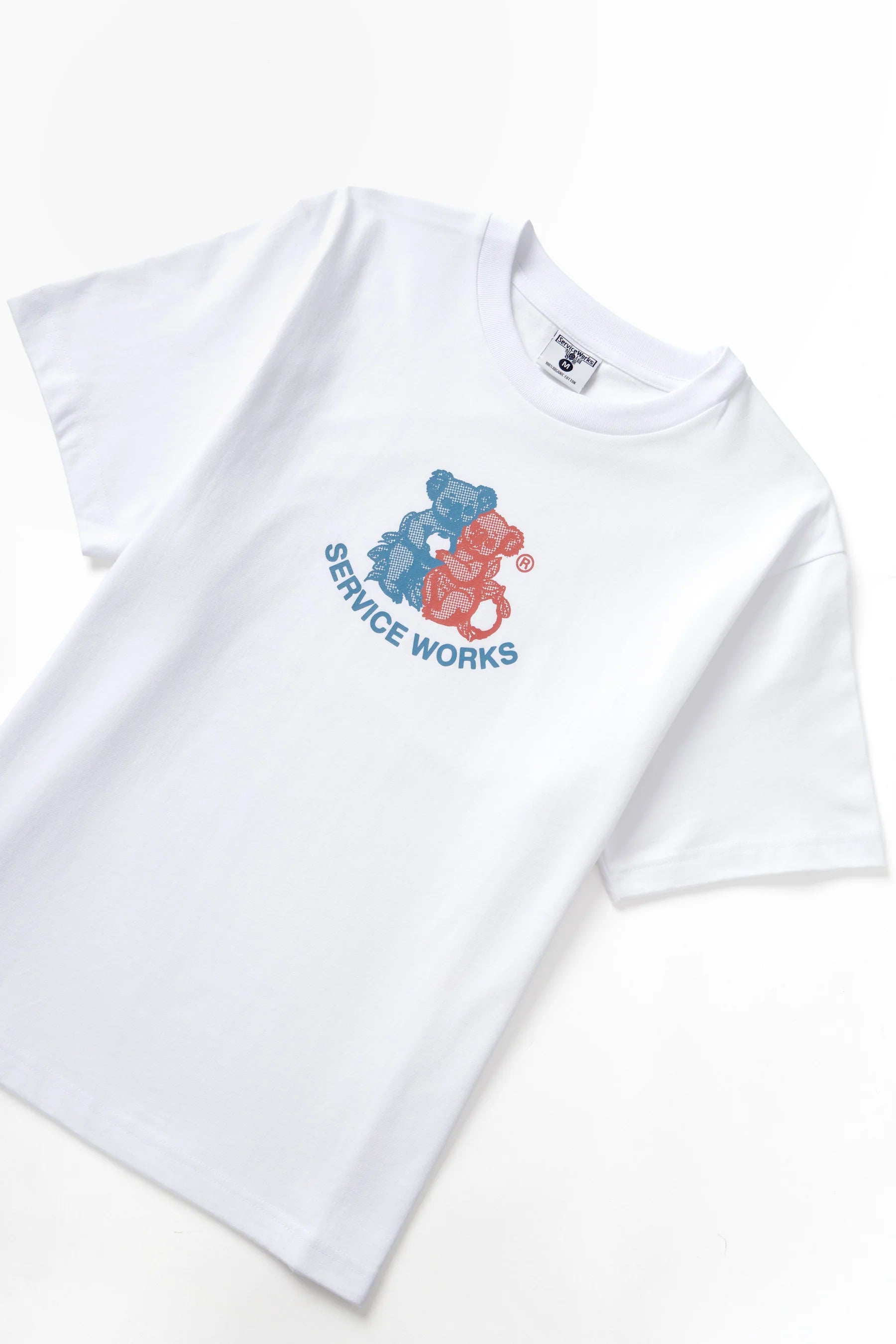 A Eckhaus Latta Shirt pictured on a model in front of a white background. The title of the product is Eckhaus Latta Eclipse Turtleneck - Stone and the image was taken by 199A®.