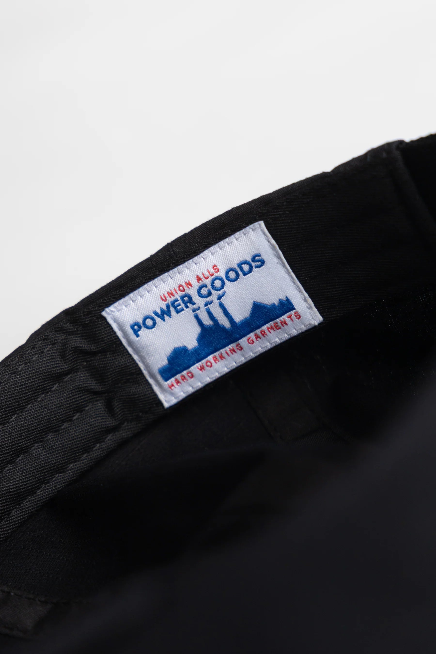 A Eckhaus Latta Shirt pictured on a model in front of a white background. The title of the product is Eckhaus Latta Eclipse Turtleneck - Stone and the image was taken by 199A®.