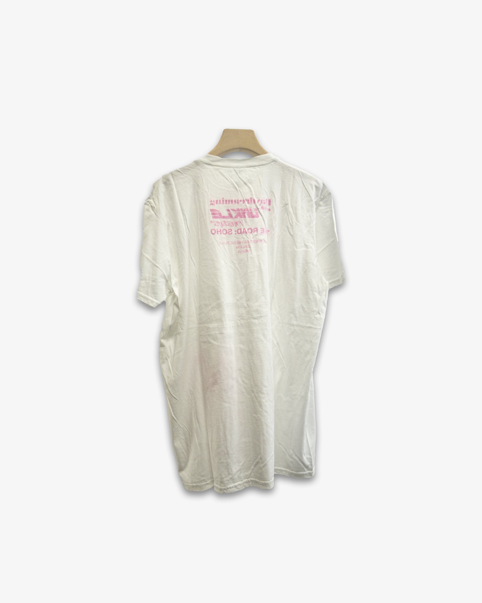 A Eckhaus Latta Shirt pictured on a model in front of a white background. The title of the product is Eckhaus Latta Eclipse Turtleneck - Stone and the image was taken by 199A®.