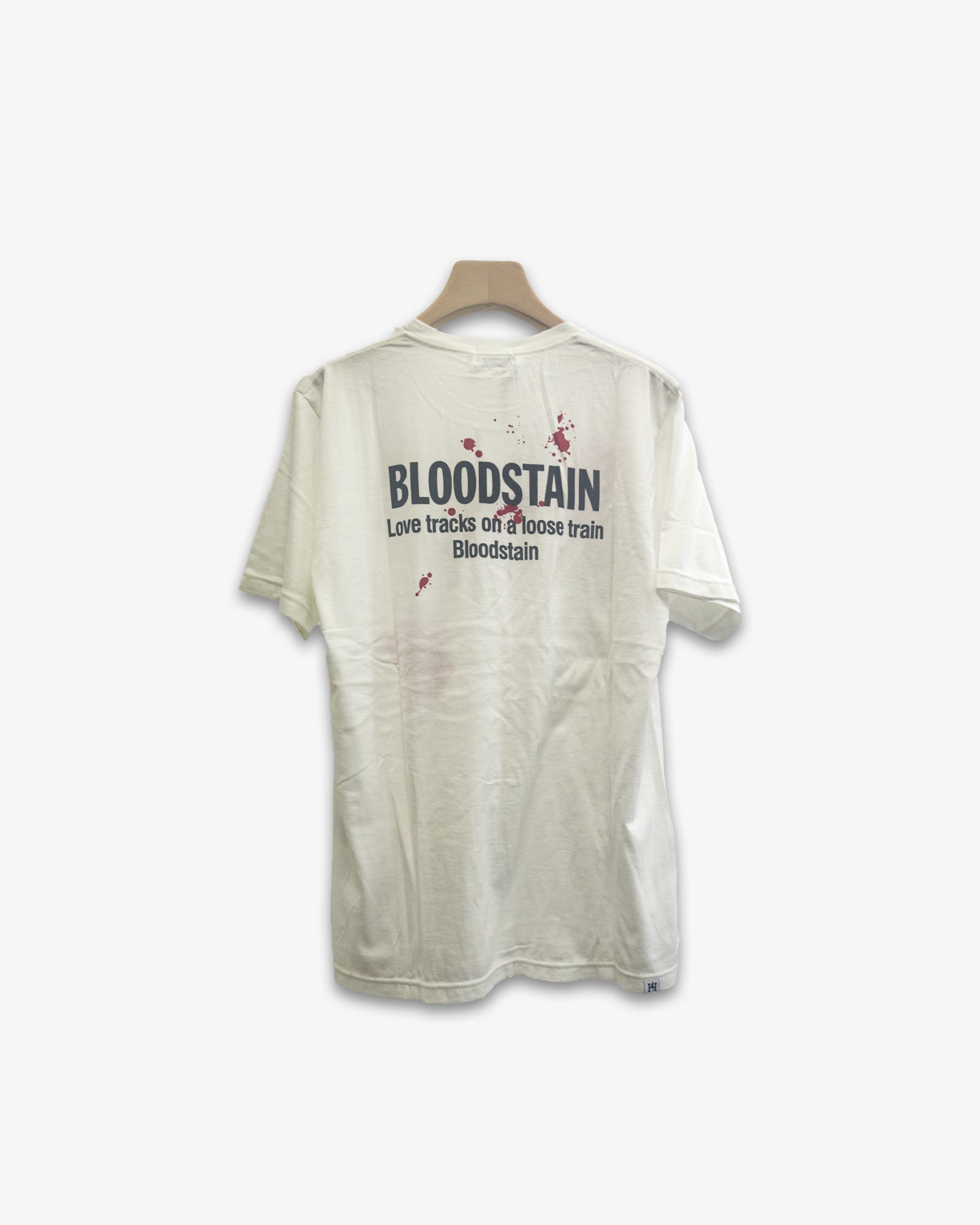 A Eckhaus Latta Shirt pictured on a model in front of a white background. The title of the product is Eckhaus Latta Eclipse Turtleneck - Stone and the image was taken by 199A®.