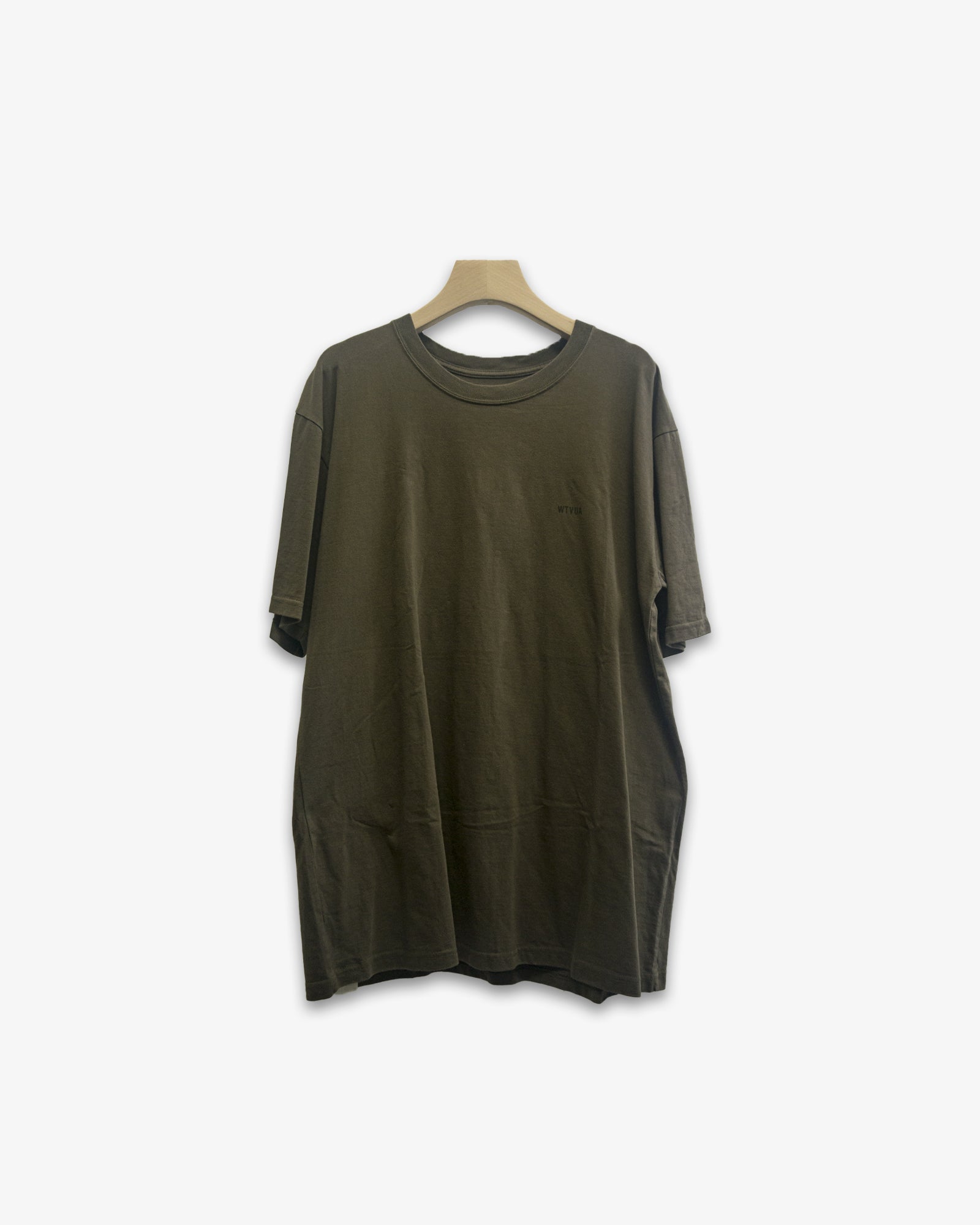 A Eckhaus Latta Shirt pictured on a model in front of a white background. The title of the product is Eckhaus Latta Eclipse Turtleneck - Stone and the image was taken by 199A®.