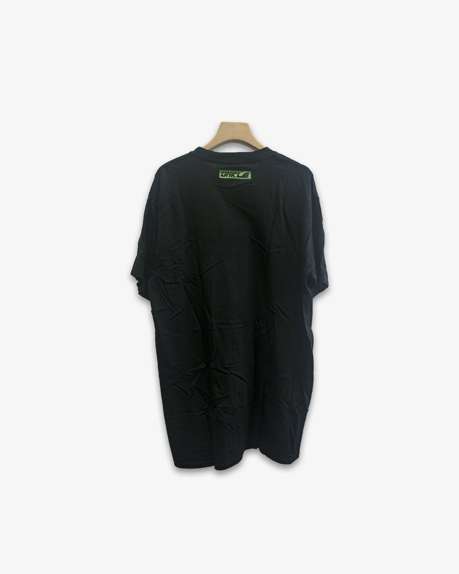 A Eckhaus Latta Shirt pictured on a model in front of a white background. The title of the product is Eckhaus Latta Eclipse Turtleneck - Stone and the image was taken by 199A®.