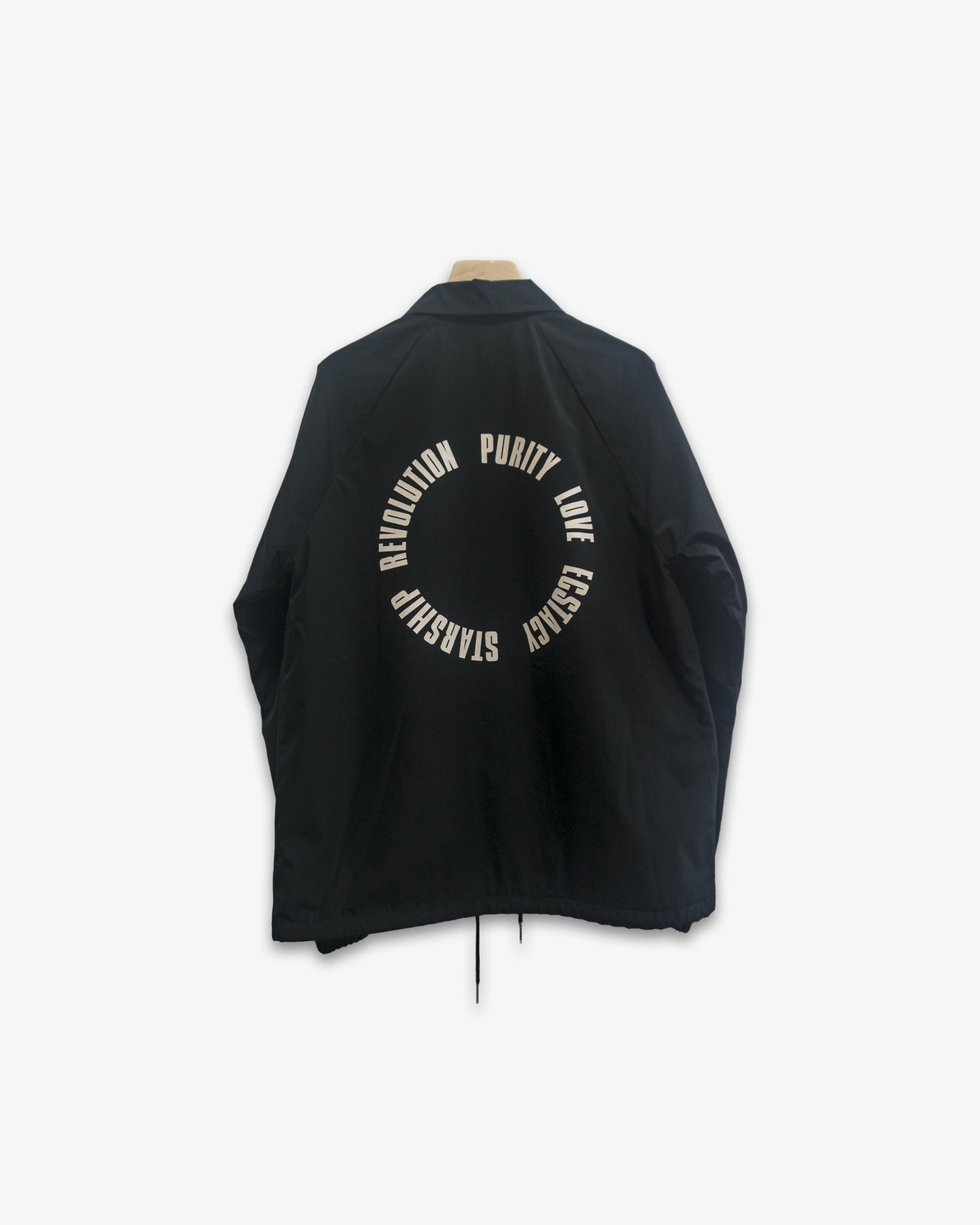 A Eckhaus Latta Shirt pictured on a model in front of a white background. The title of the product is Eckhaus Latta Eclipse Turtleneck - Stone and the image was taken by 199A®.