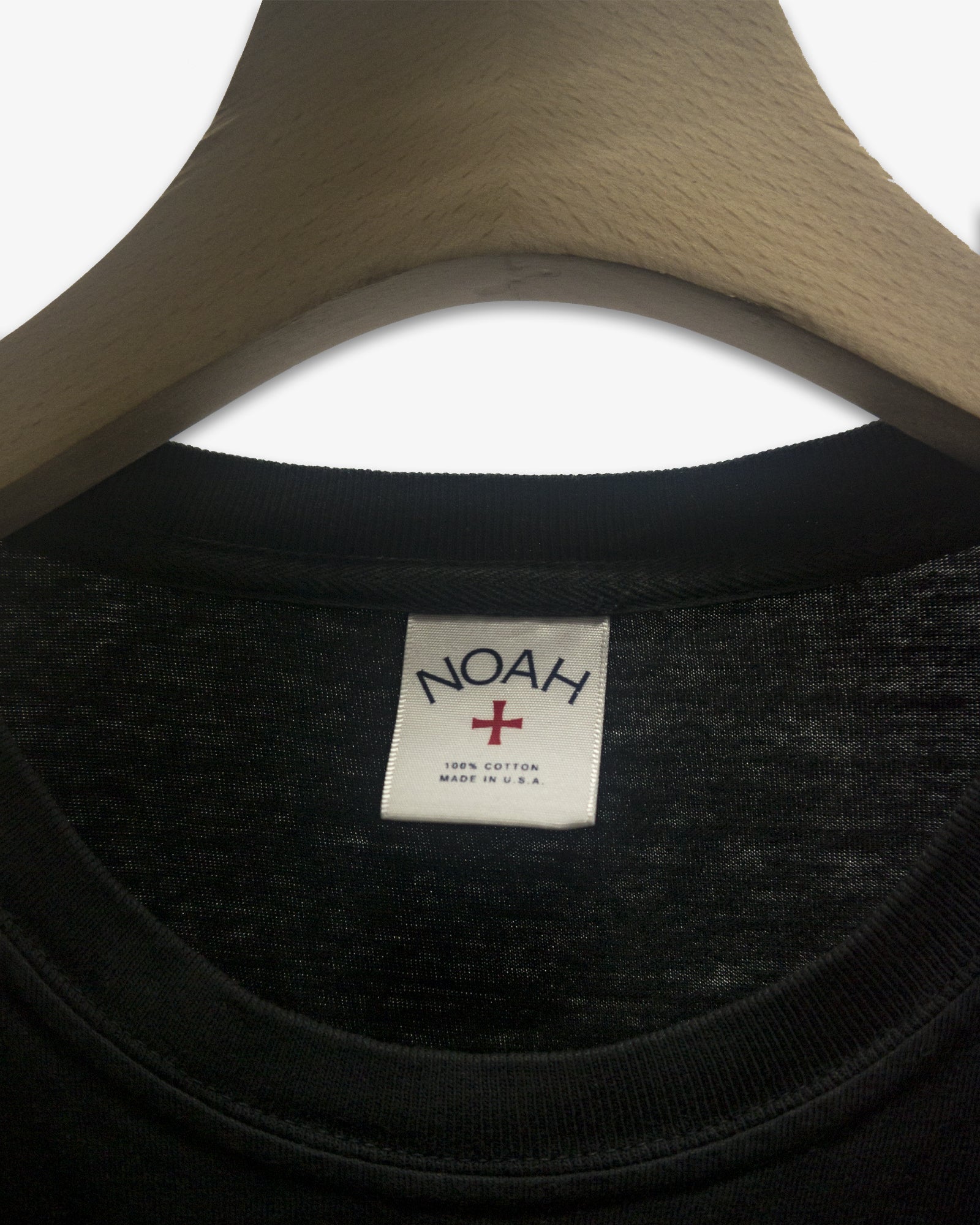 A Eckhaus Latta Shirt pictured on a model in front of a white background. The title of the product is Eckhaus Latta Eclipse Turtleneck - Stone and the image was taken by 199A®.