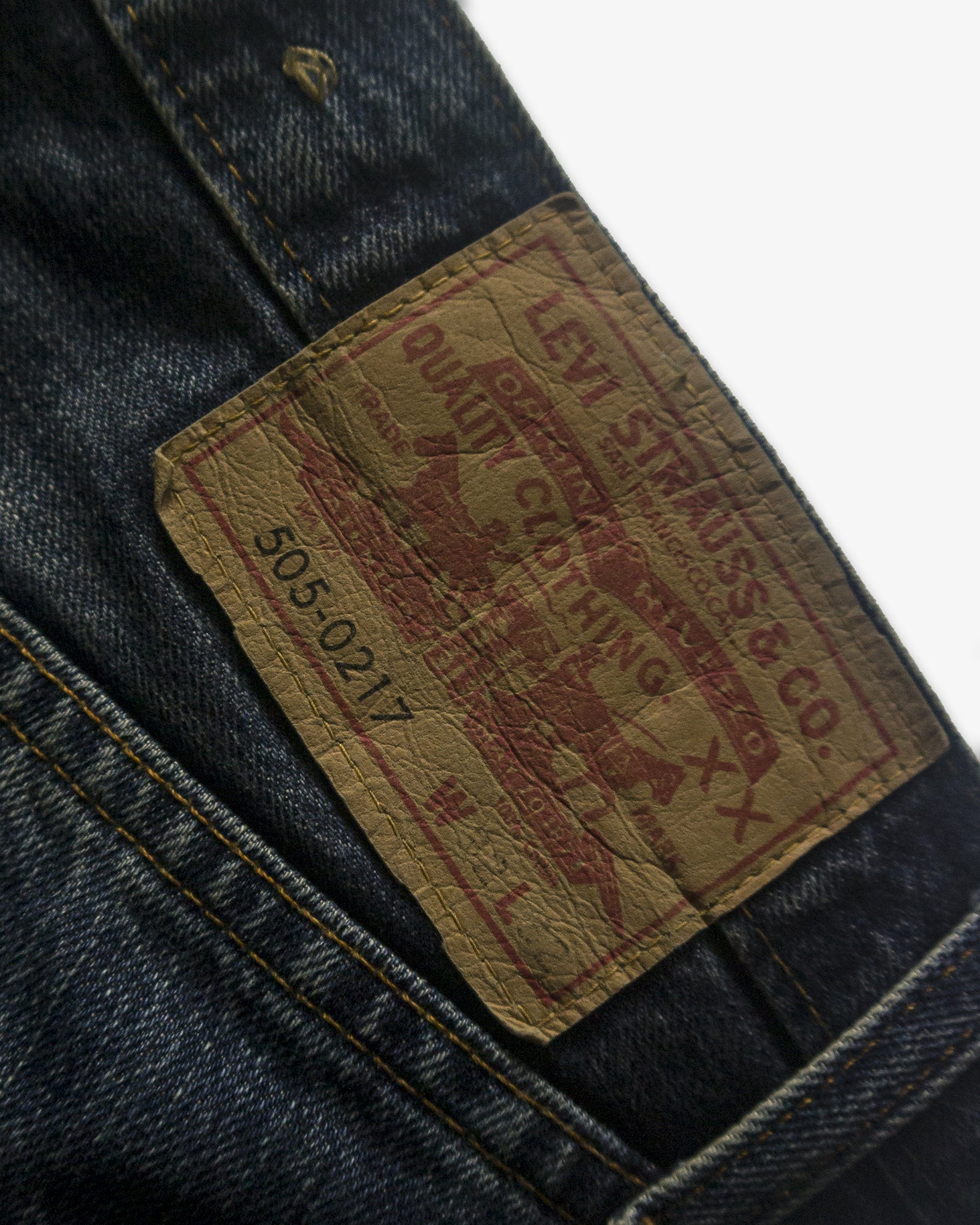 A Eckhaus Latta Shirt pictured on a model in front of a white background. The title of the product is Eckhaus Latta Eclipse Turtleneck - Stone and the image was taken by 199A®.