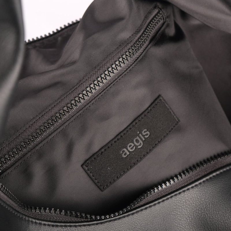 A Eckhaus Latta Shirt pictured on a model in front of a white background. The title of the product is Eckhaus Latta Eclipse Turtleneck - Stone and the image was taken by 199A®.