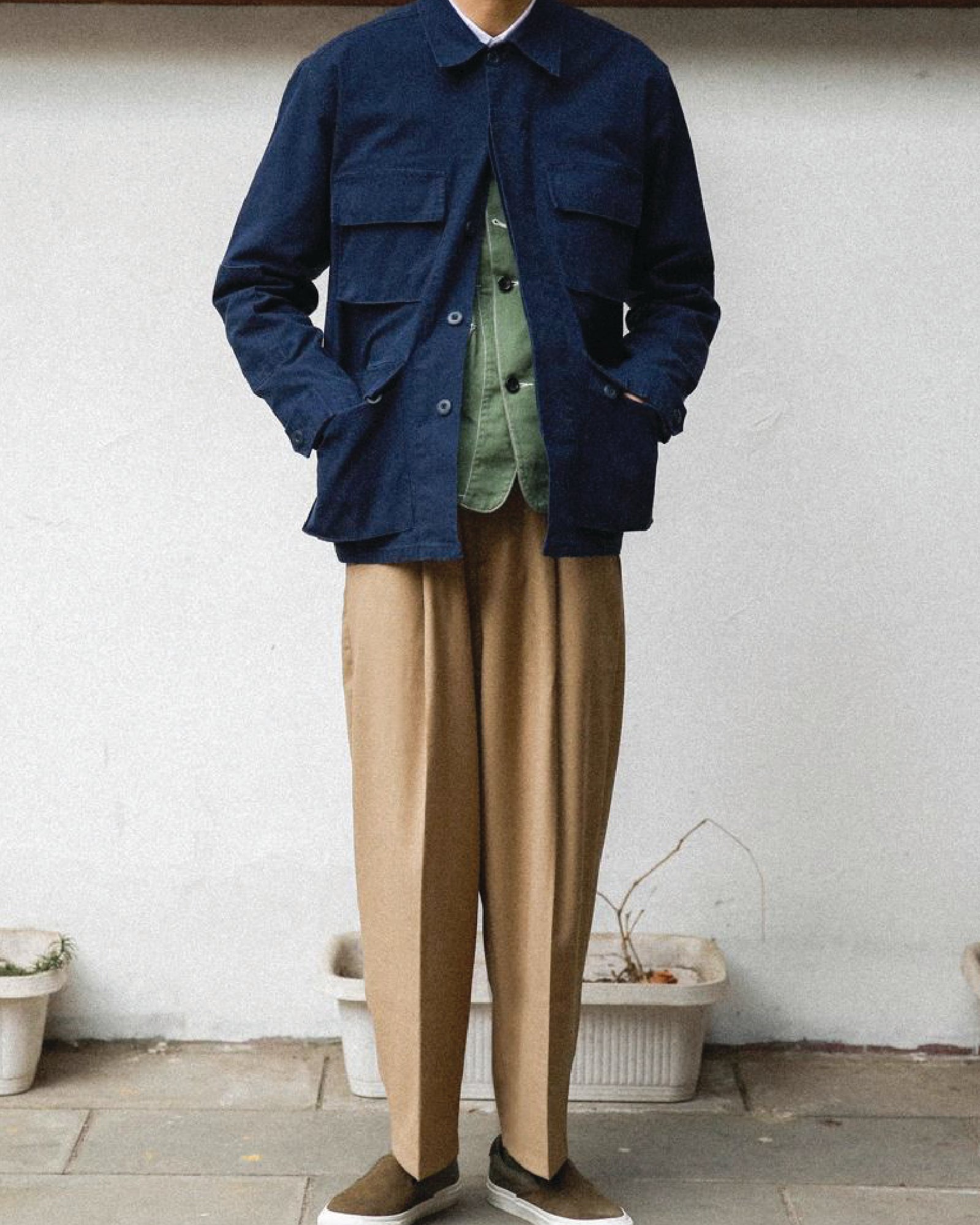 A Eckhaus Latta Shirt pictured on a model in front of a white background. The title of the product is Eckhaus Latta Eclipse Turtleneck - Stone and the image was taken by 199A®.