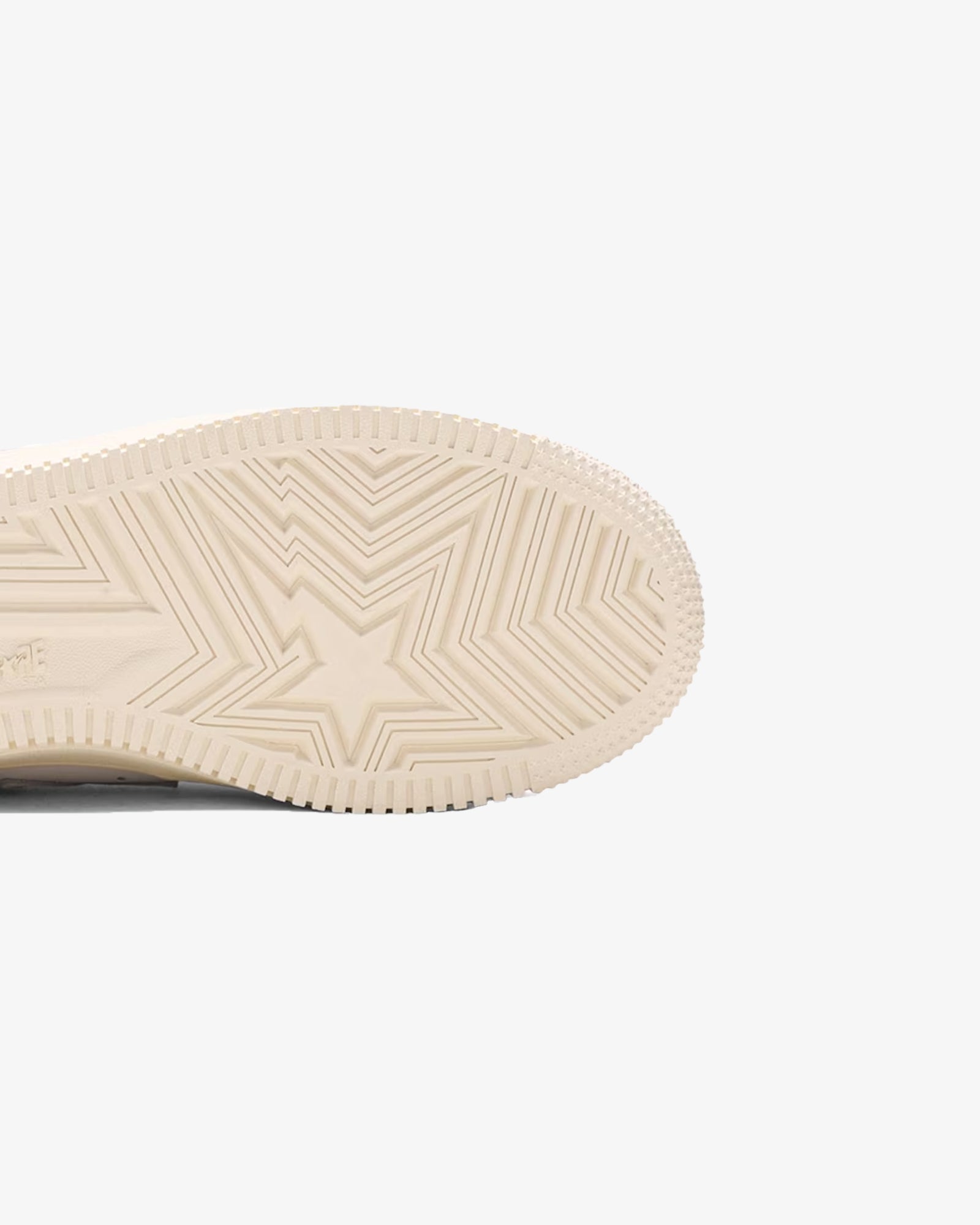 A Eckhaus Latta Shirt pictured on a model in front of a white background. The title of the product is Eckhaus Latta Eclipse Turtleneck - Stone and the image was taken by 199A®.