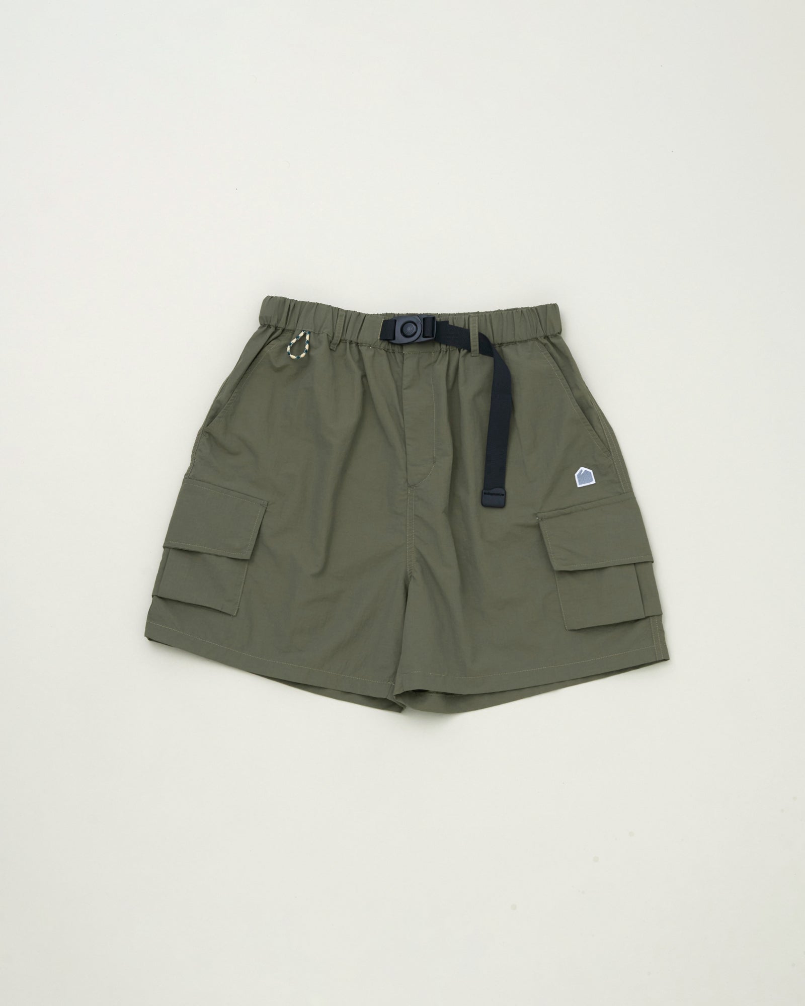 A Eckhaus Latta Shirt pictured on a model in front of a white background. The title of the product is Eckhaus Latta Eclipse Turtleneck - Stone and the image was taken by 199A®.