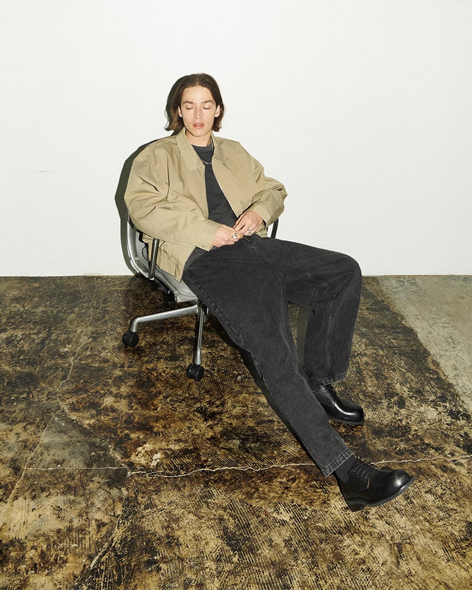 A Eckhaus Latta Shirt pictured on a model in front of a white background. The title of the product is Eckhaus Latta Eclipse Turtleneck - Stone and the image was taken by 199A®.