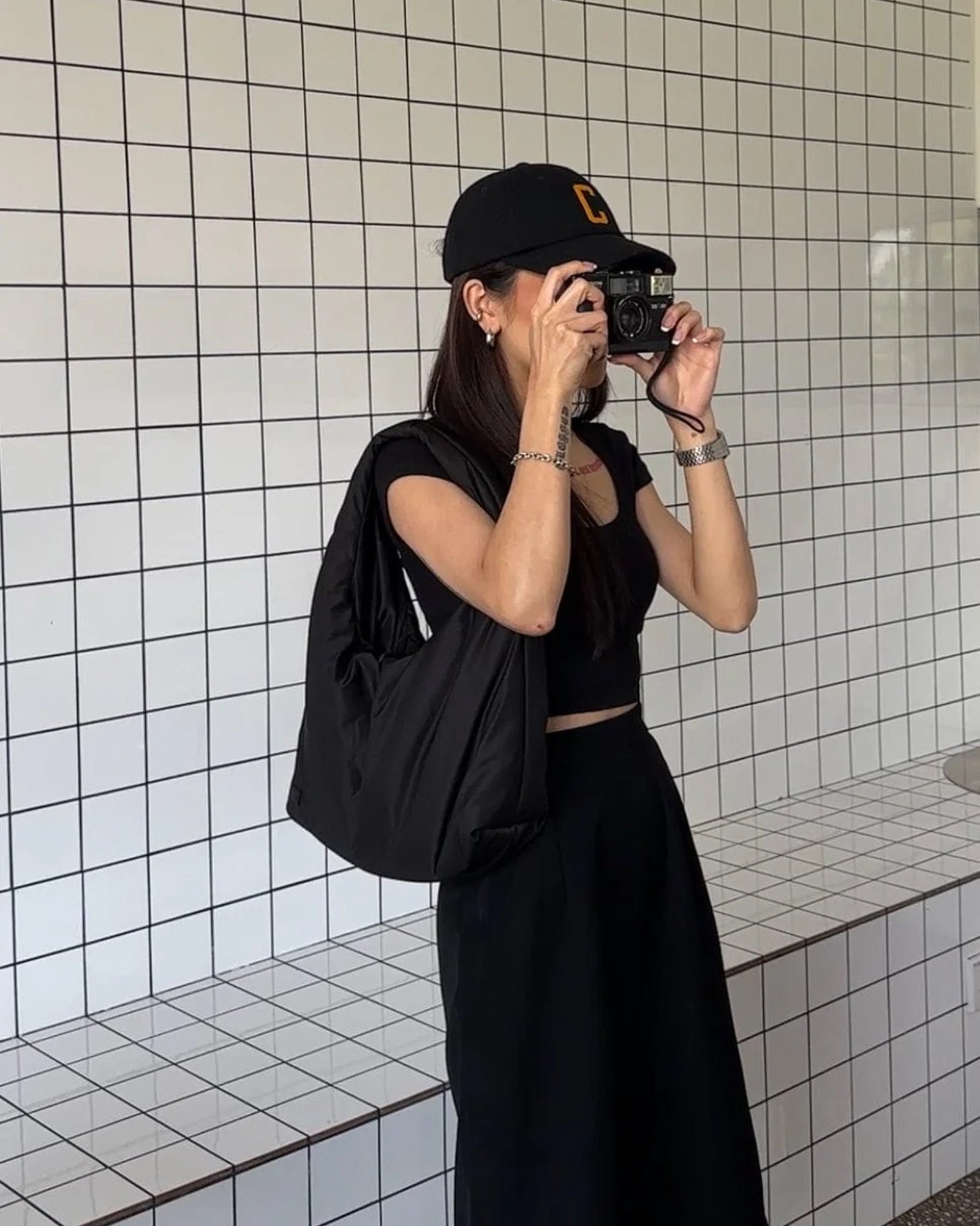 A Eckhaus Latta Shirt pictured on a model in front of a white background. The title of the product is Eckhaus Latta Eclipse Turtleneck - Stone and the image was taken by 199A®.