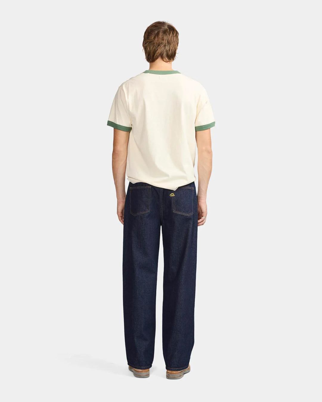 A Eckhaus Latta Shirt pictured on a model in front of a white background. The title of the product is Eckhaus Latta Eclipse Turtleneck - Stone and the image was taken by 199A®.