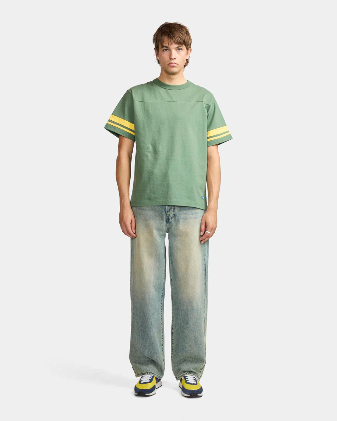 A Eckhaus Latta Shirt pictured on a model in front of a white background. The title of the product is Eckhaus Latta Eclipse Turtleneck - Stone and the image was taken by 199A®.