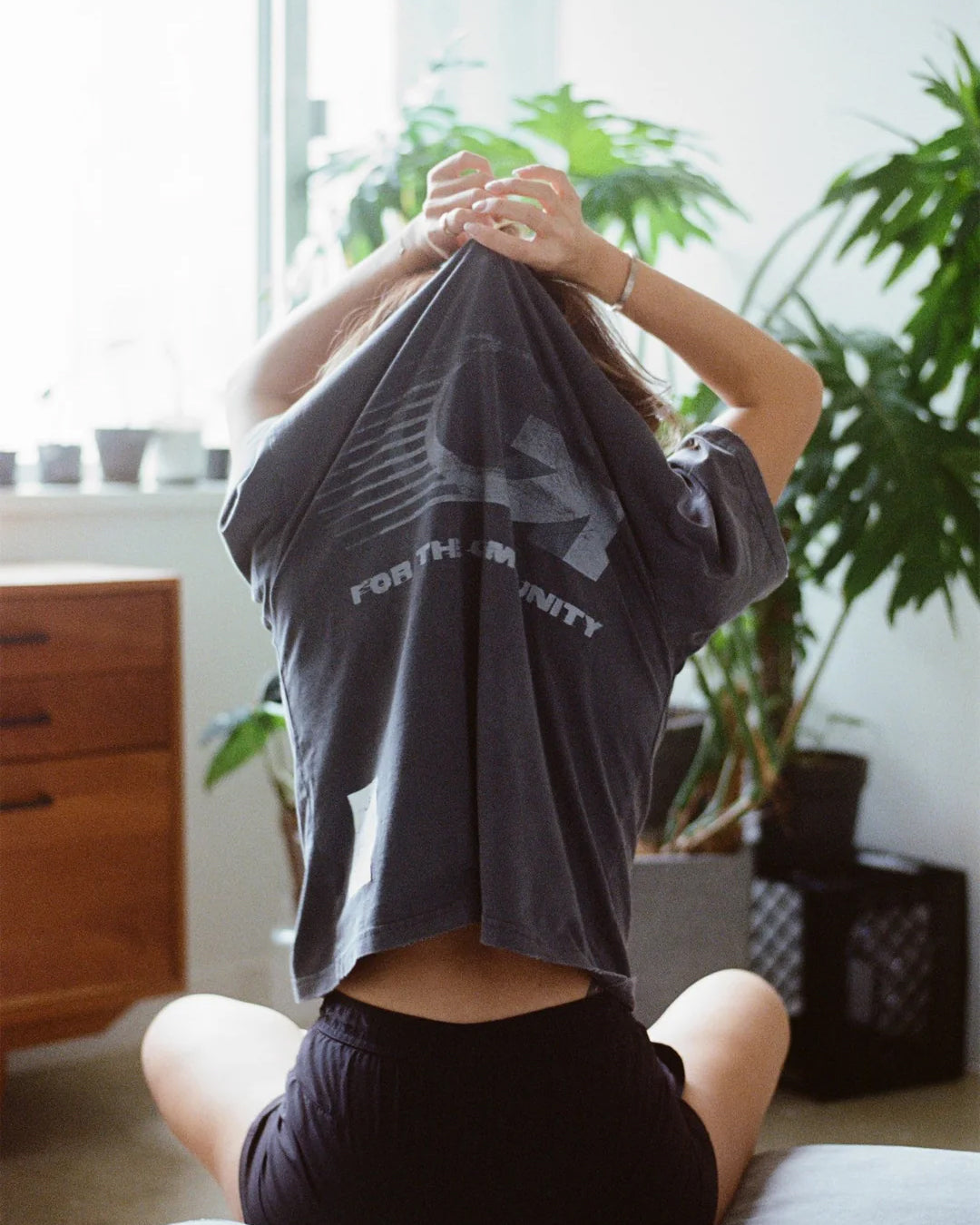 A Eckhaus Latta Shirt pictured on a model in front of a white background. The title of the product is Eckhaus Latta Eclipse Turtleneck - Stone and the image was taken by 199A®.