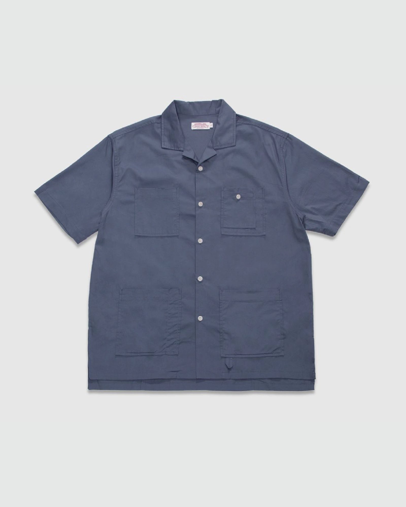 A Eckhaus Latta Shirt pictured on a model in front of a white background. The title of the product is Eckhaus Latta Eclipse Turtleneck - Stone and the image was taken by 199A®.