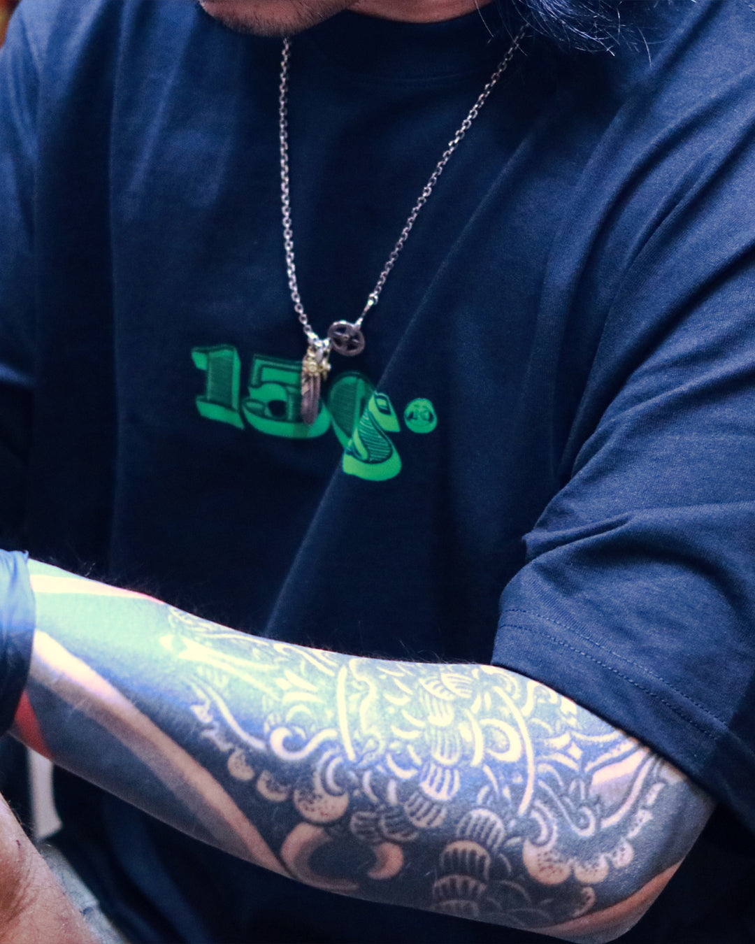 A Eckhaus Latta Shirt pictured on a model in front of a white background. The title of the product is Eckhaus Latta Eclipse Turtleneck - Stone and the image was taken by 199A®.