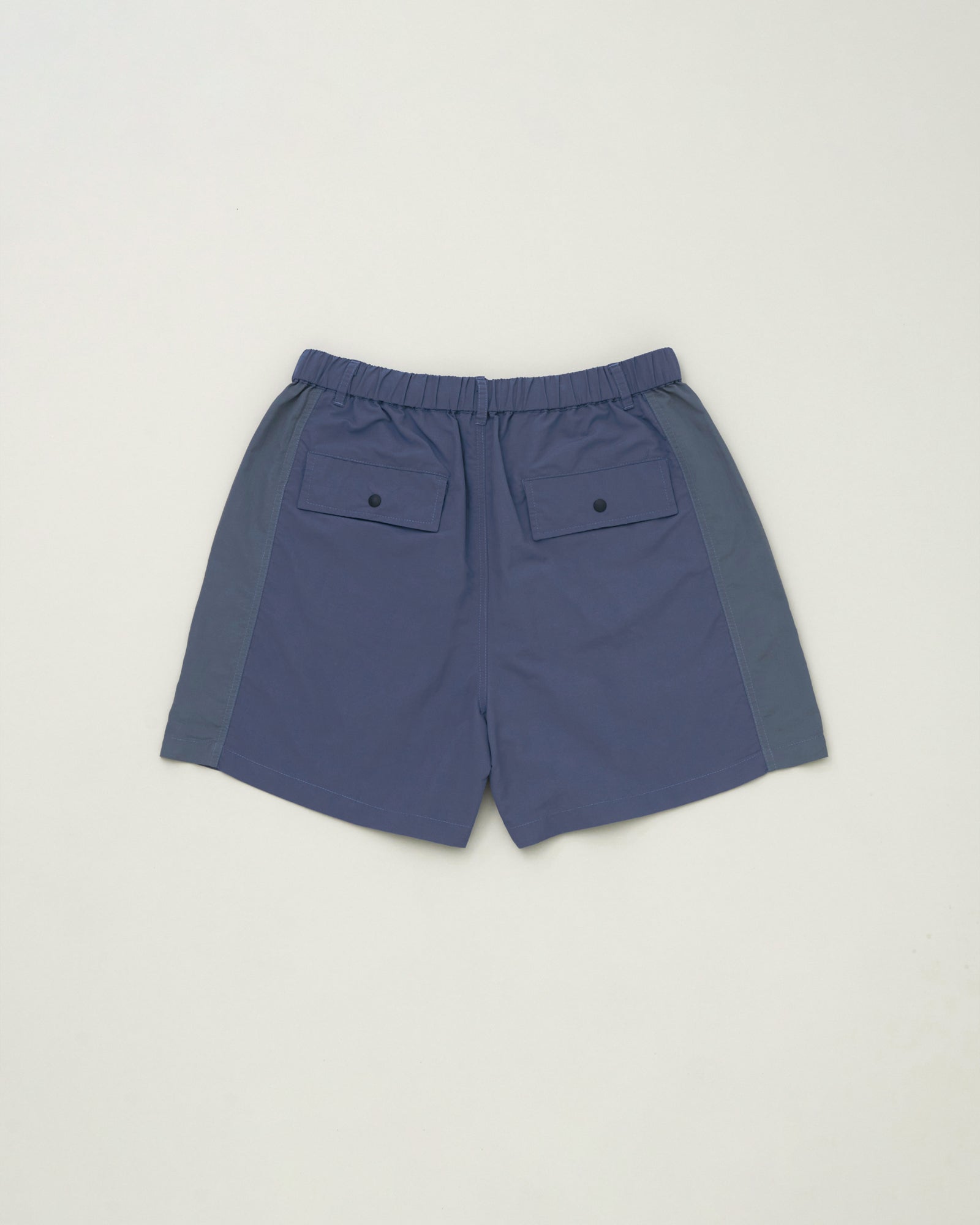 A Eckhaus Latta Shirt pictured on a model in front of a white background. The title of the product is Eckhaus Latta Eclipse Turtleneck - Stone and the image was taken by 199A®.