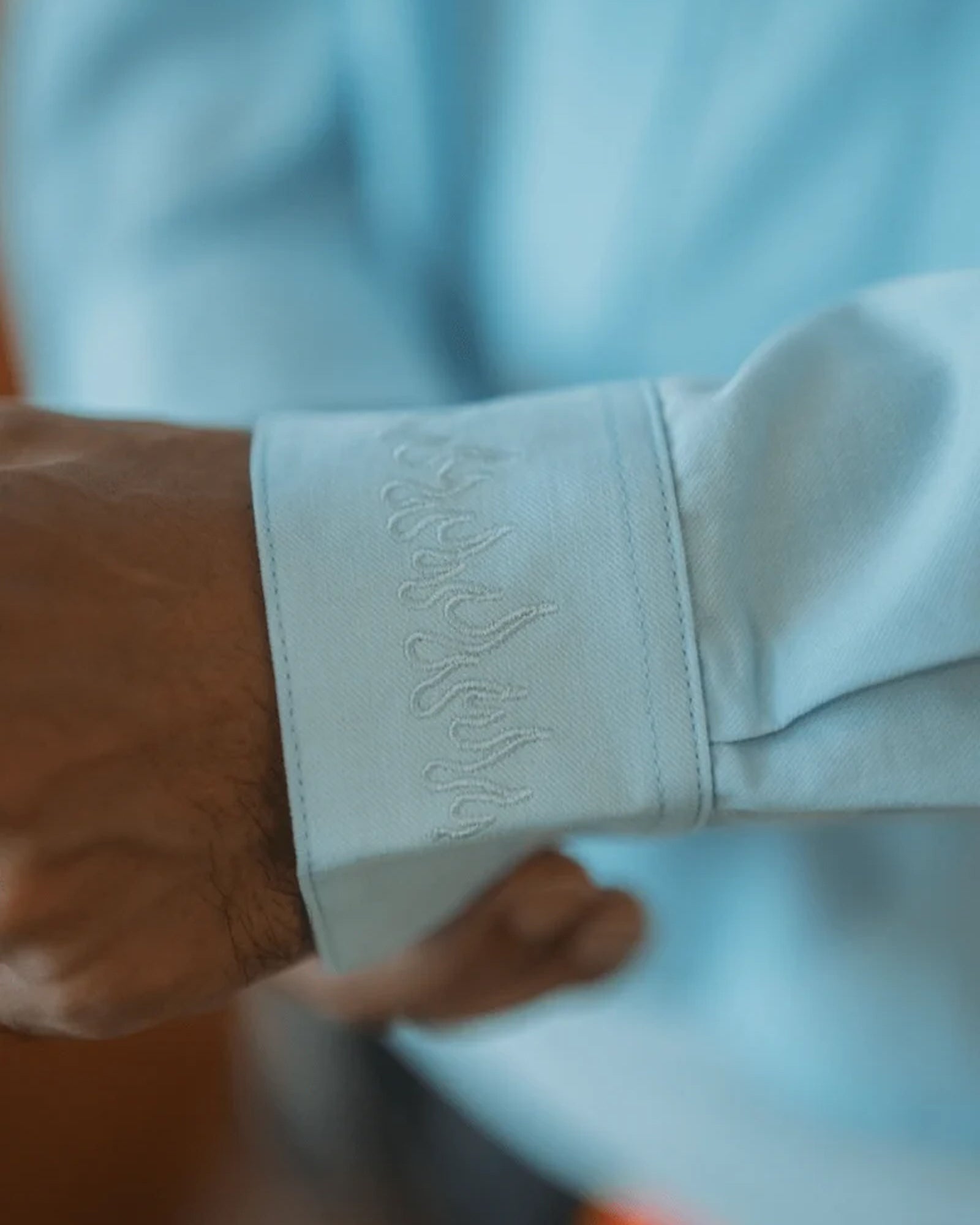 A Eckhaus Latta Shirt pictured on a model in front of a white background. The title of the product is Eckhaus Latta Eclipse Turtleneck - Stone and the image was taken by 199A®.