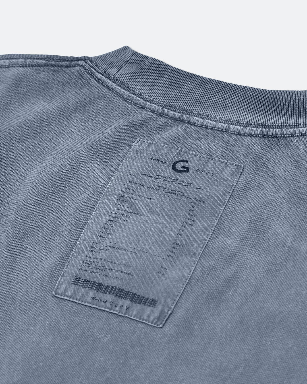 A Eckhaus Latta Shirt pictured on a model in front of a white background. The title of the product is Eckhaus Latta Eclipse Turtleneck - Stone and the image was taken by 199A®.