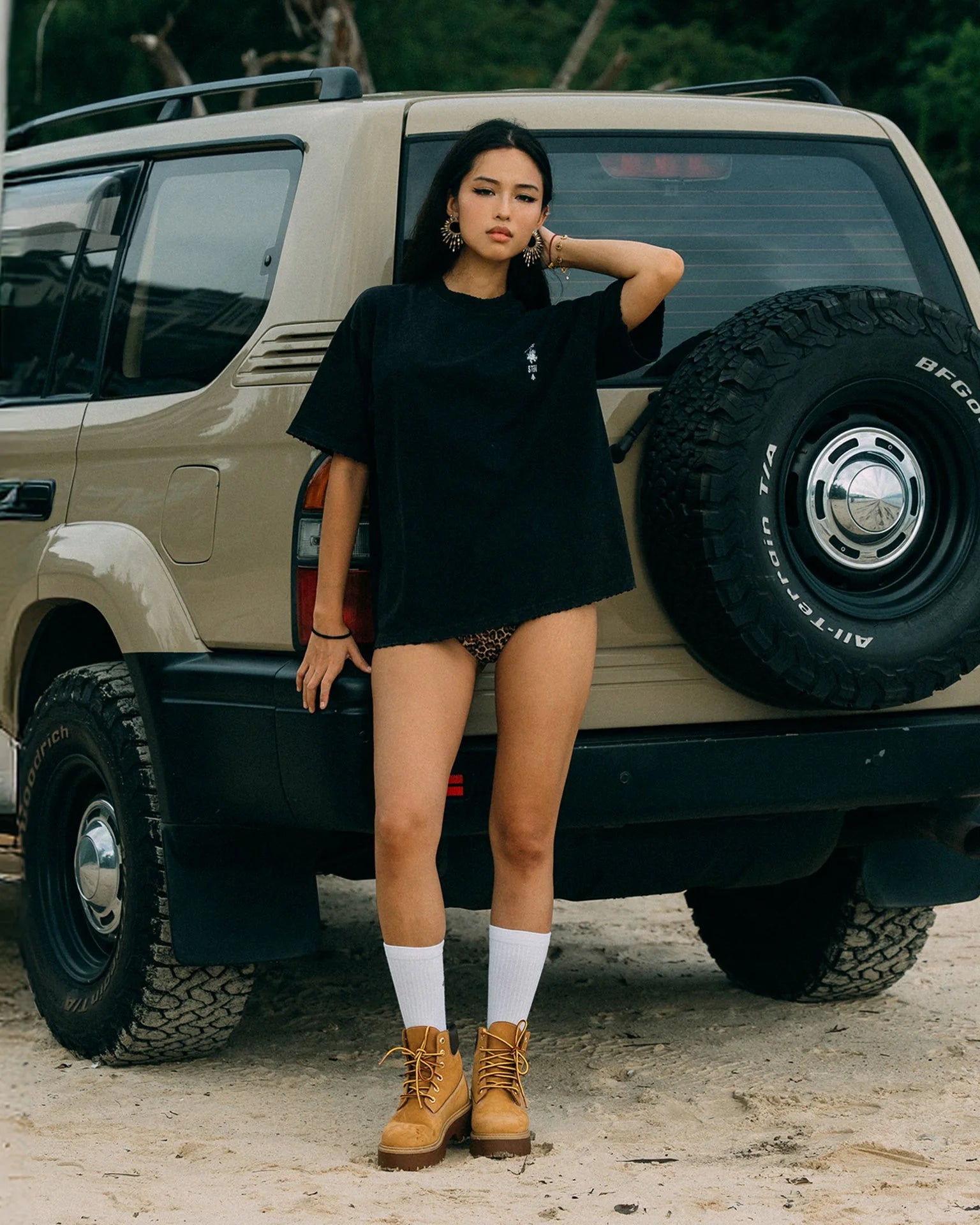 A Eckhaus Latta Shirt pictured on a model in front of a white background. The title of the product is Eckhaus Latta Eclipse Turtleneck - Stone and the image was taken by 199A®.