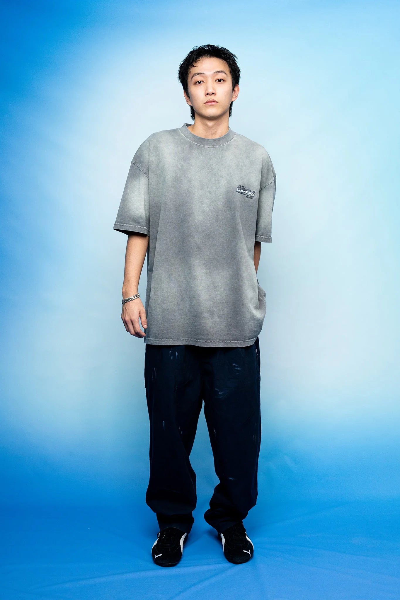 A Eckhaus Latta Shirt pictured on a model in front of a white background. The title of the product is Eckhaus Latta Eclipse Turtleneck - Stone and the image was taken by 199A®.