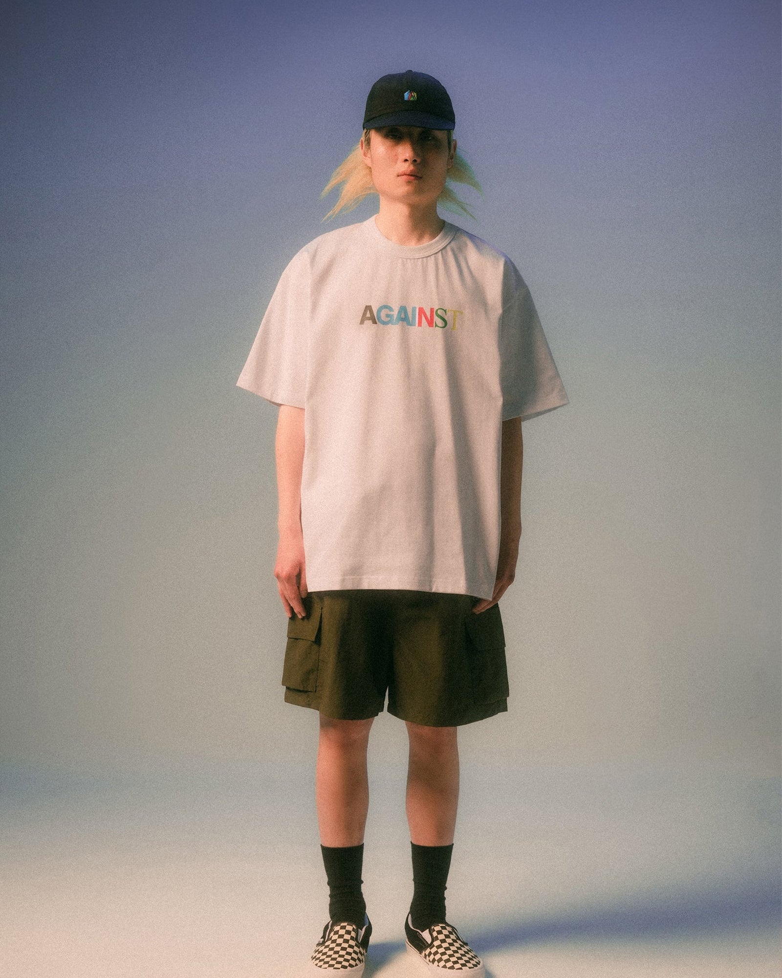 A Eckhaus Latta Shirt pictured on a model in front of a white background. The title of the product is Eckhaus Latta Eclipse Turtleneck - Stone and the image was taken by 199A®.