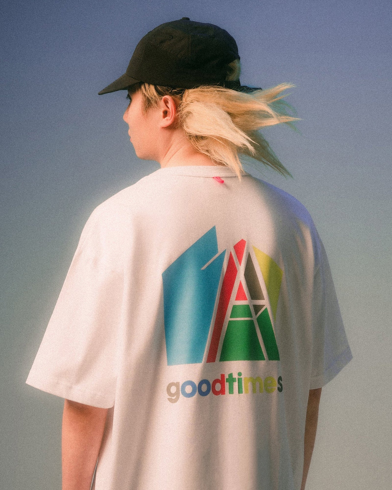 A Eckhaus Latta Shirt pictured on a model in front of a white background. The title of the product is Eckhaus Latta Eclipse Turtleneck - Stone and the image was taken by 199A®.