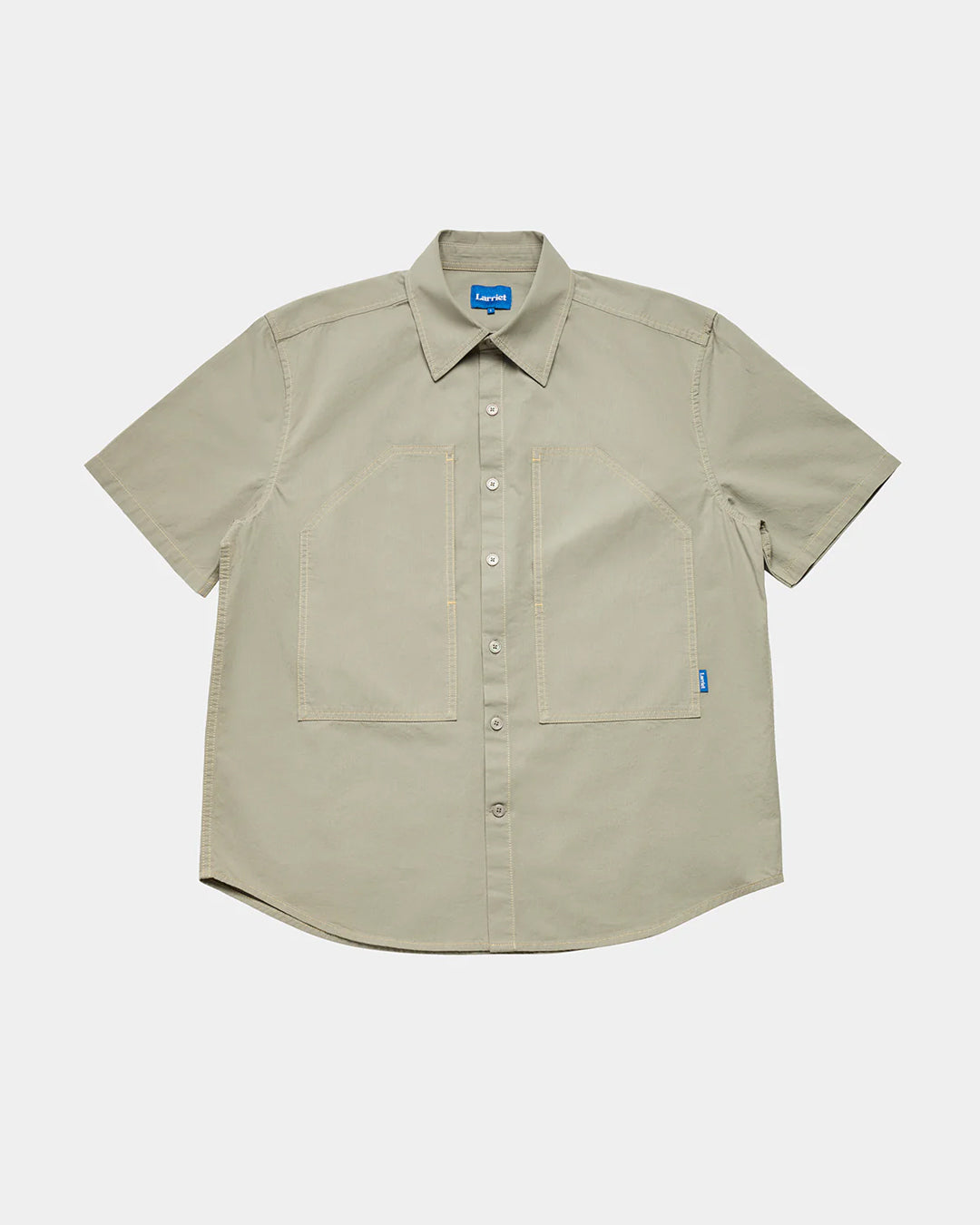 A Eckhaus Latta Shirt pictured on a model in front of a white background. The title of the product is Eckhaus Latta Eclipse Turtleneck - Stone and the image was taken by 199A®.