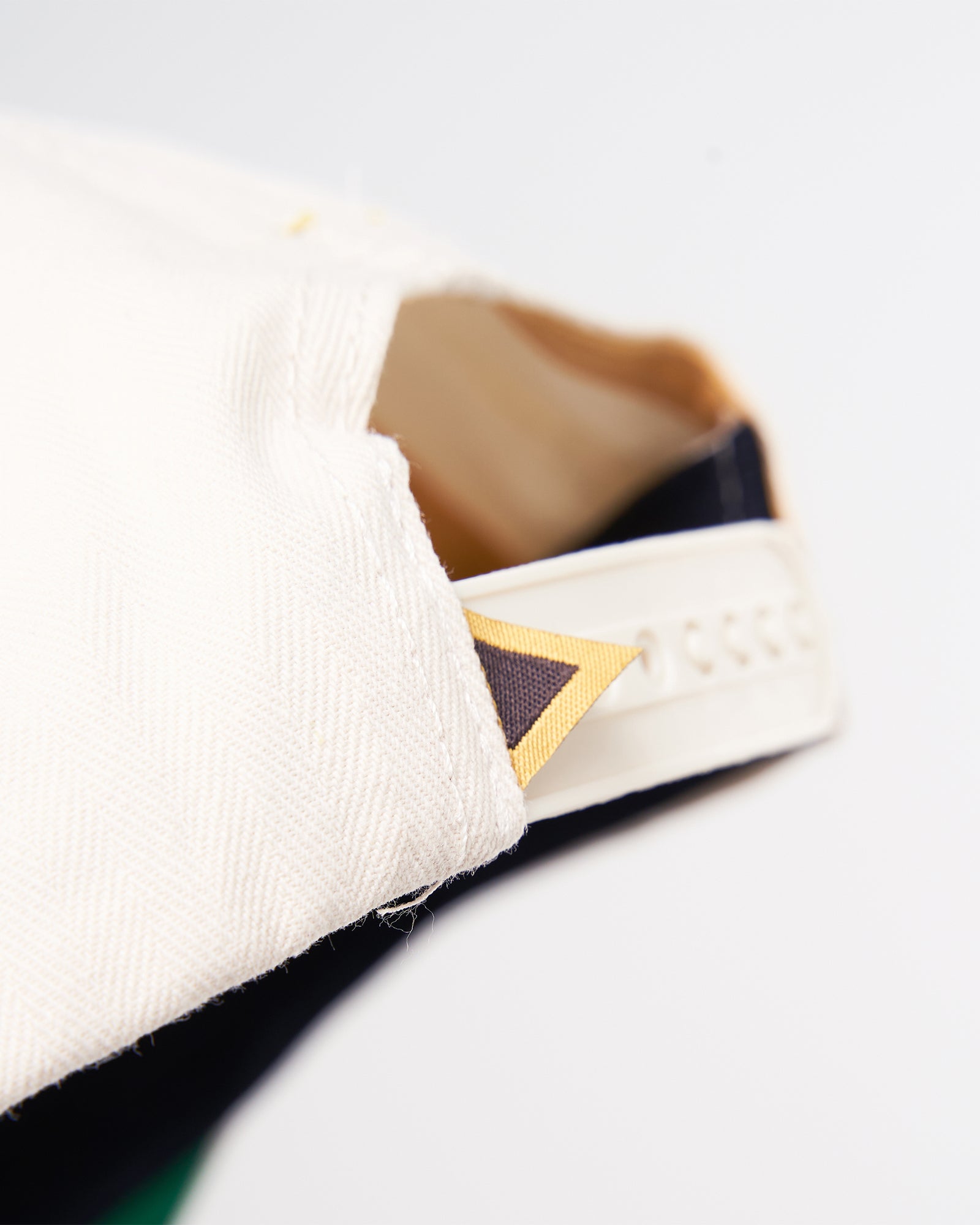 A Eckhaus Latta Shirt pictured on a model in front of a white background. The title of the product is Eckhaus Latta Eclipse Turtleneck - Stone and the image was taken by 199A®.