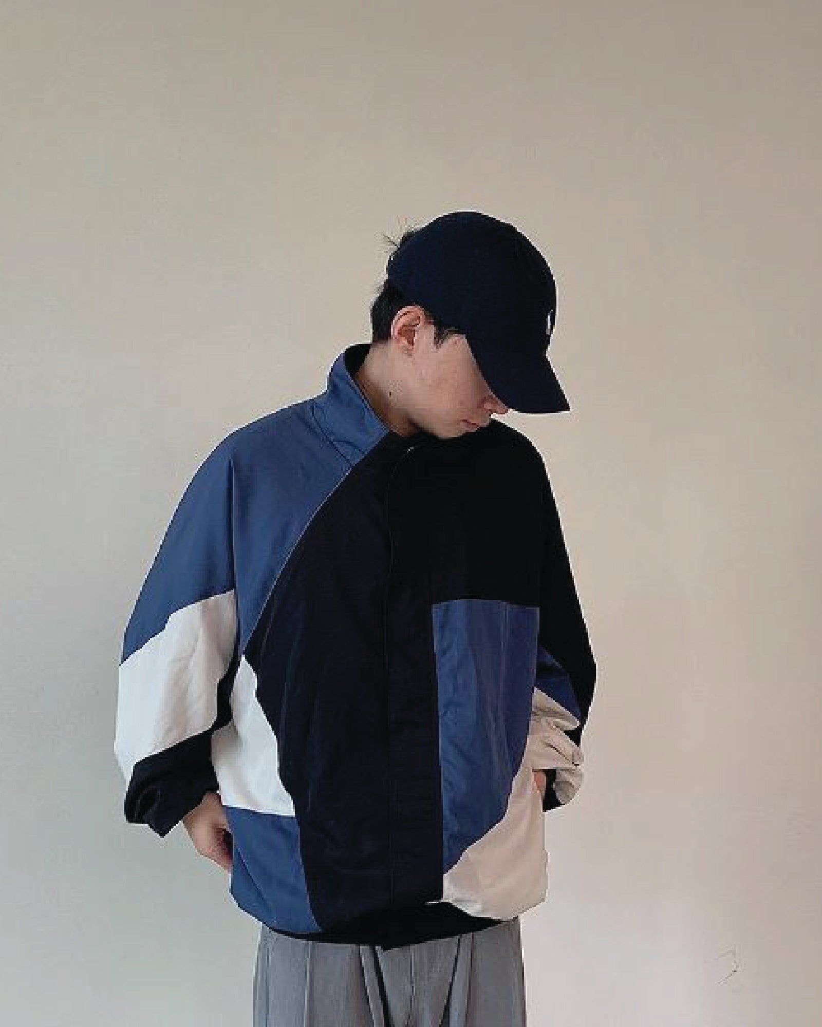 A Eckhaus Latta Shirt pictured on a model in front of a white background. The title of the product is Eckhaus Latta Eclipse Turtleneck - Stone and the image was taken by 199A®.