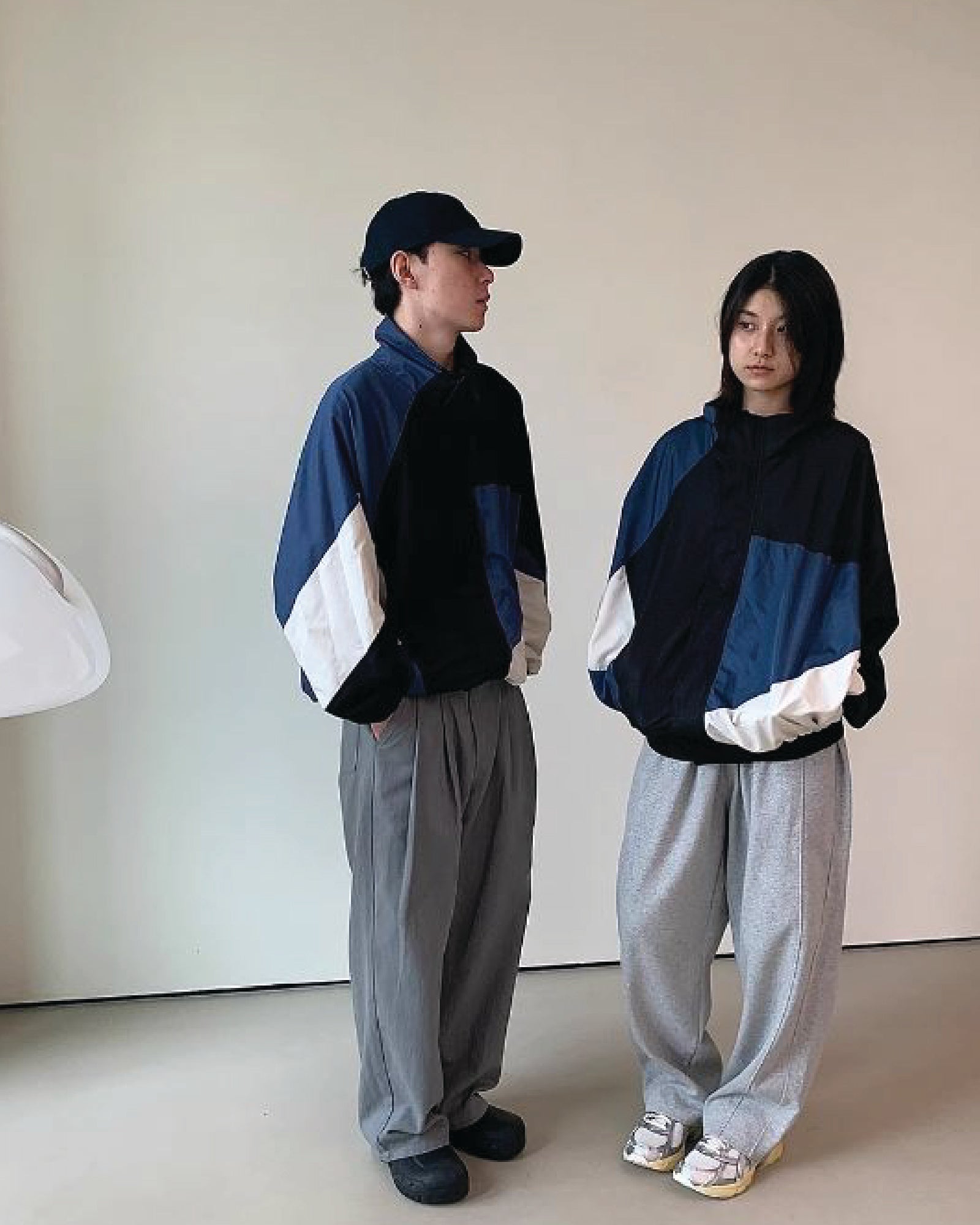 A Eckhaus Latta Shirt pictured on a model in front of a white background. The title of the product is Eckhaus Latta Eclipse Turtleneck - Stone and the image was taken by 199A®.
