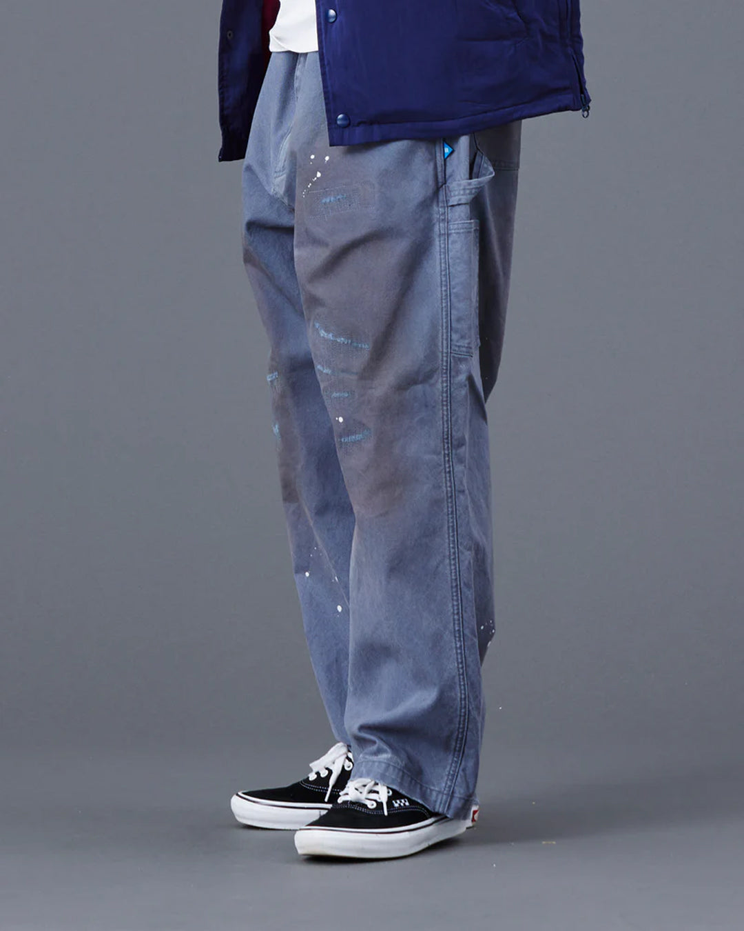 A Eckhaus Latta Shirt pictured on a model in front of a white background. The title of the product is Eckhaus Latta Eclipse Turtleneck - Stone and the image was taken by 199A®.