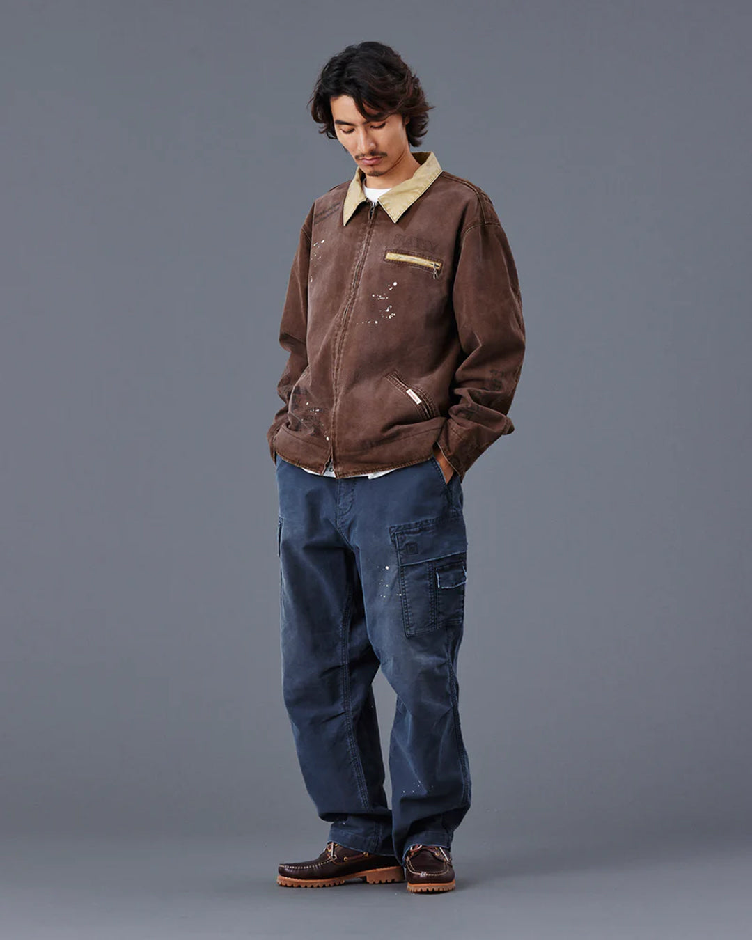 A Eckhaus Latta Shirt pictured on a model in front of a white background. The title of the product is Eckhaus Latta Eclipse Turtleneck - Stone and the image was taken by 199A®.