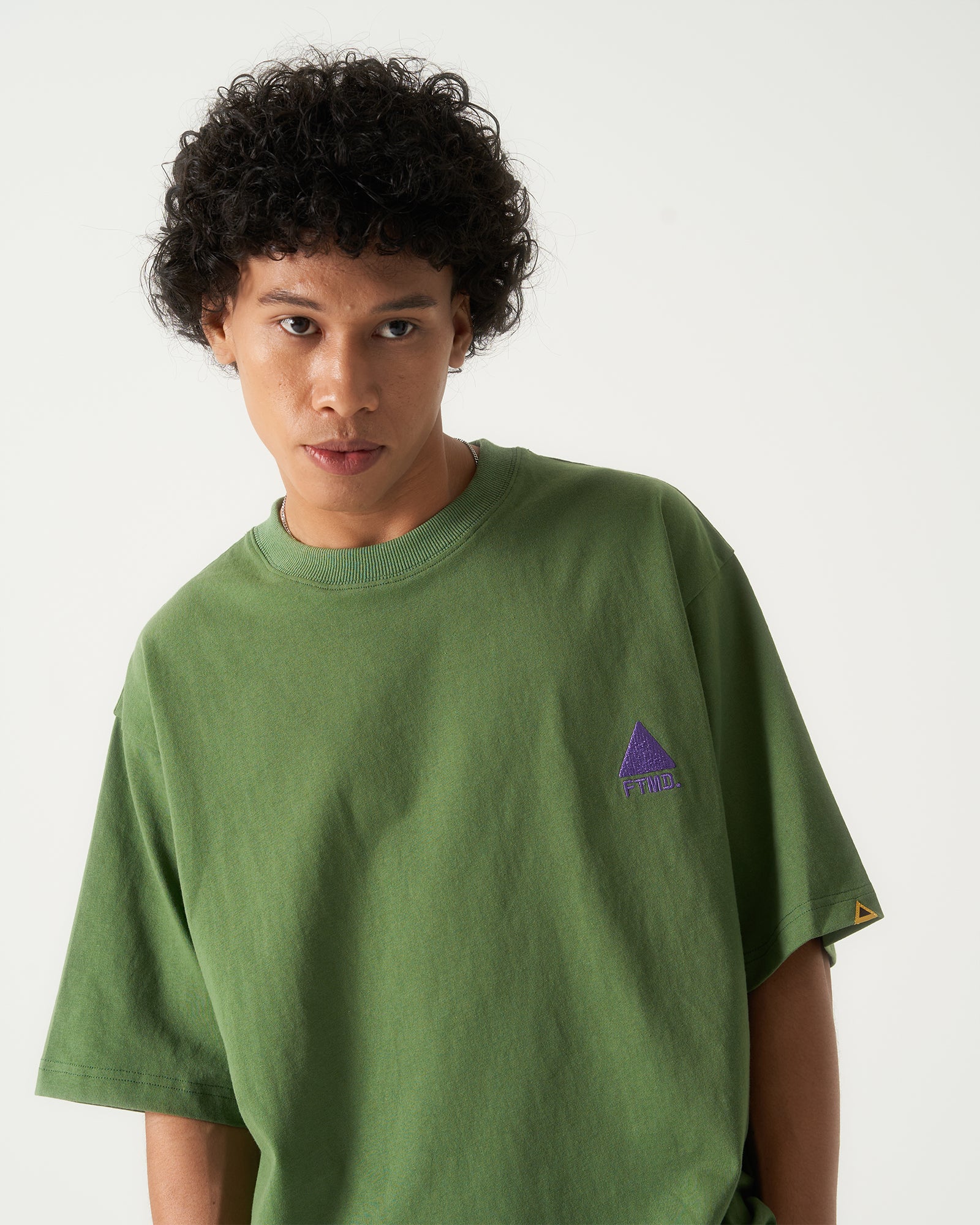 A Eckhaus Latta Shirt pictured on a model in front of a white background. The title of the product is Eckhaus Latta Eclipse Turtleneck - Stone and the image was taken by 199A®.