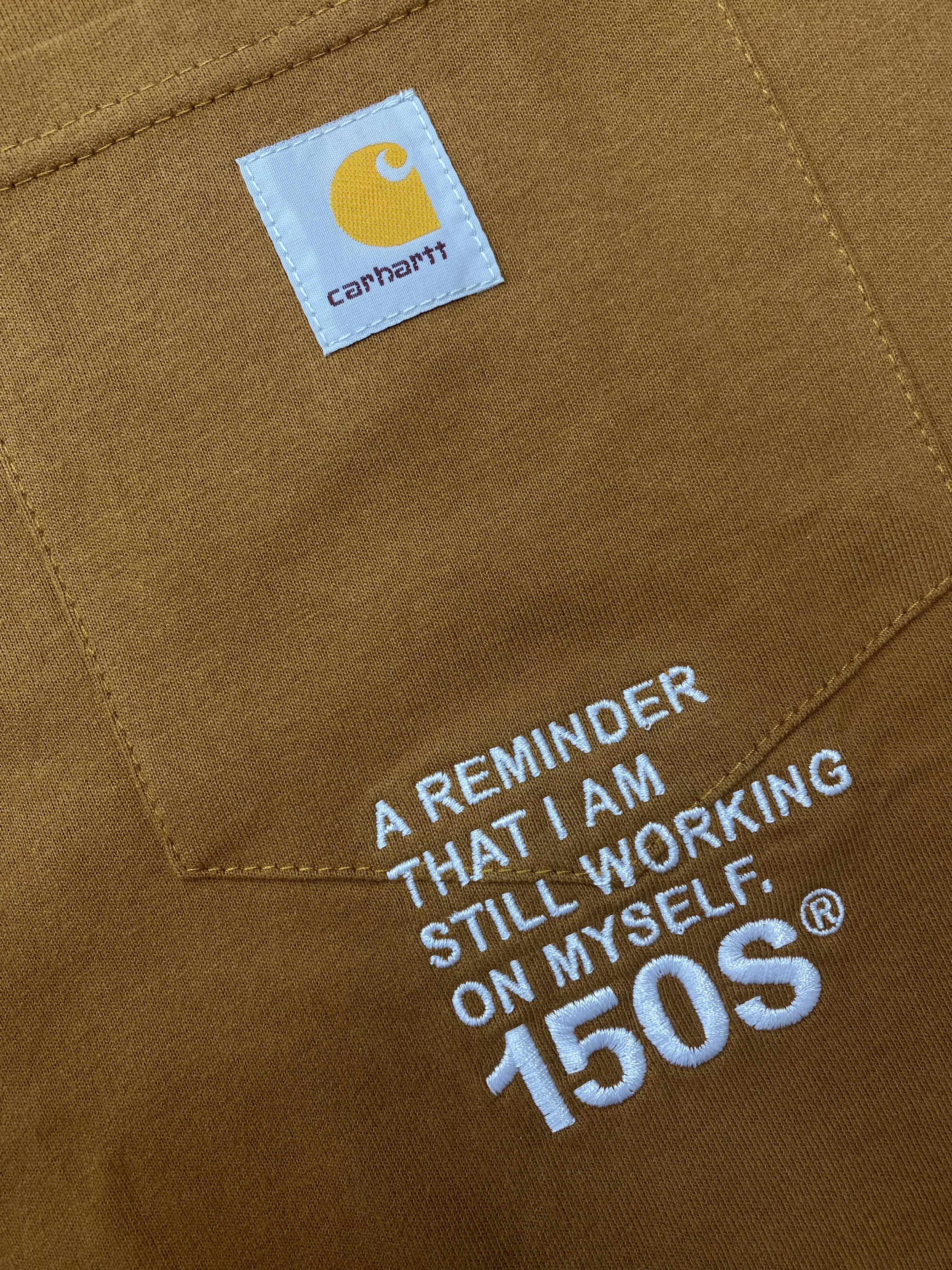 A Eckhaus Latta Shirt pictured on a model in front of a white background. The title of the product is Eckhaus Latta Eclipse Turtleneck - Stone and the image was taken by 199A®.