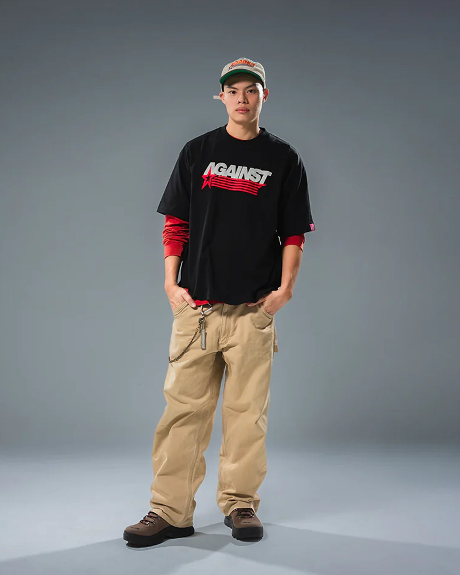 A Eckhaus Latta Shirt pictured on a model in front of a white background. The title of the product is Eckhaus Latta Eclipse Turtleneck - Stone and the image was taken by 199A®.