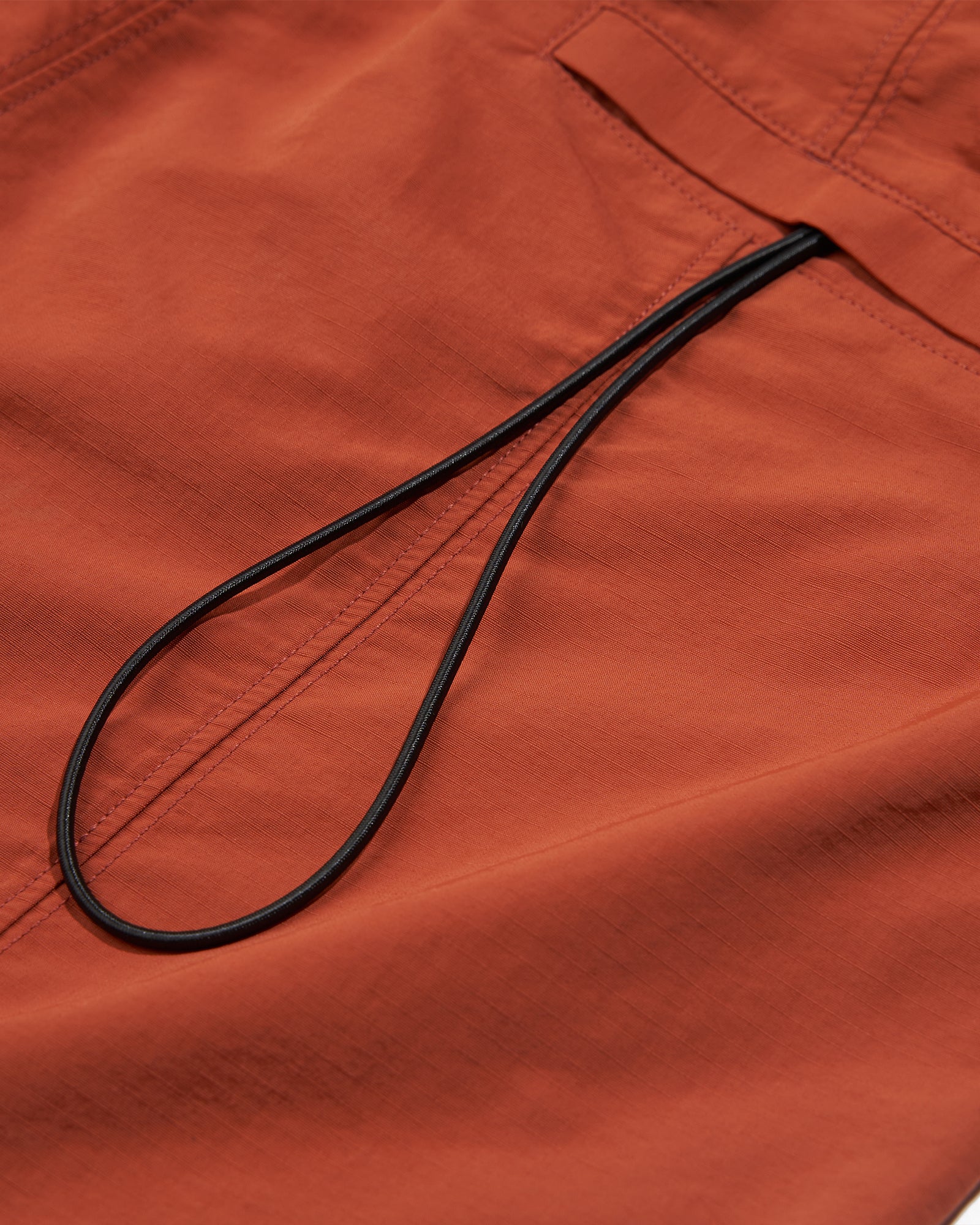 A Eckhaus Latta Shirt pictured on a model in front of a white background. The title of the product is Eckhaus Latta Eclipse Turtleneck - Stone and the image was taken by 199A®.