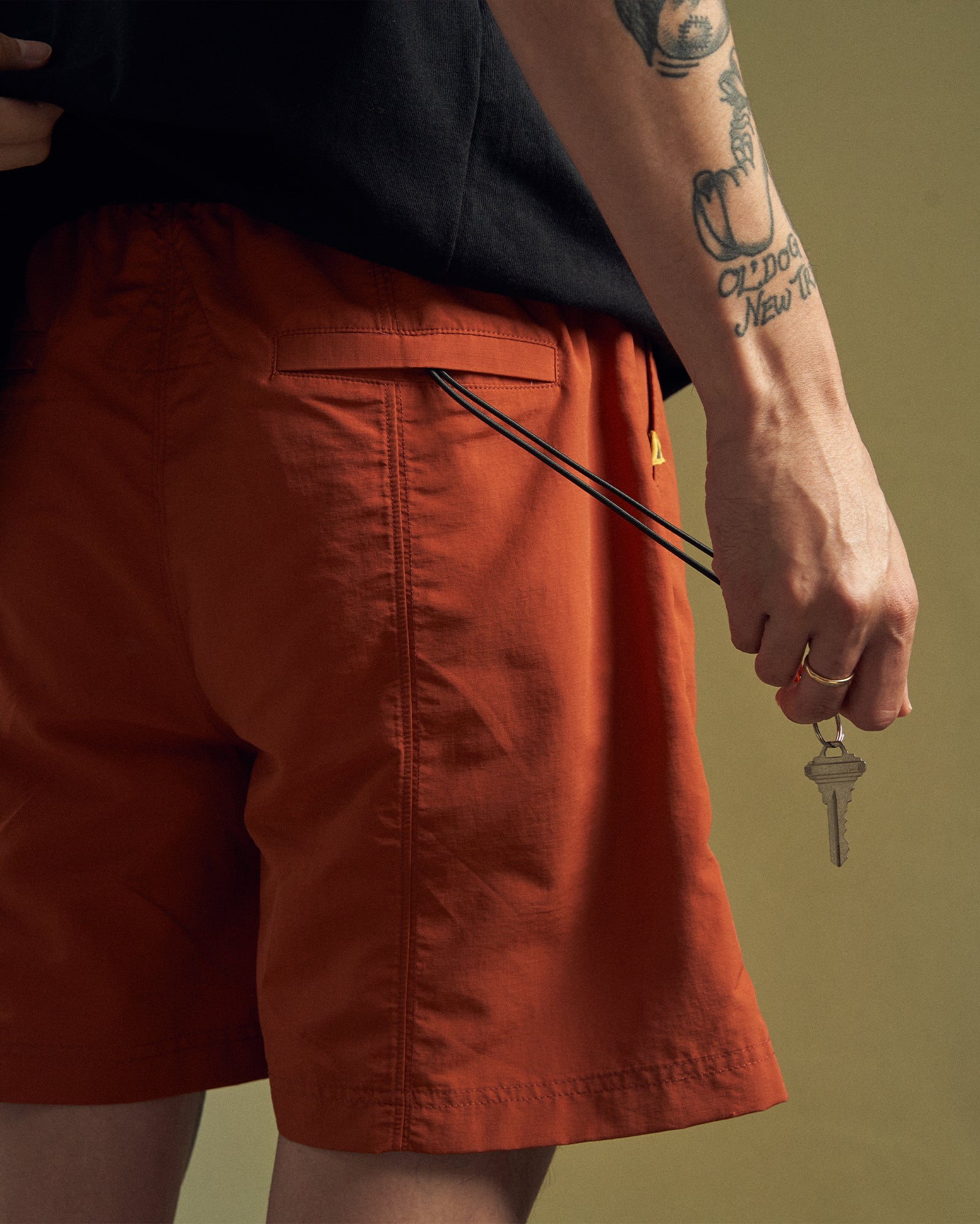 A Eckhaus Latta Shirt pictured on a model in front of a white background. The title of the product is Eckhaus Latta Eclipse Turtleneck - Stone and the image was taken by 199A®.