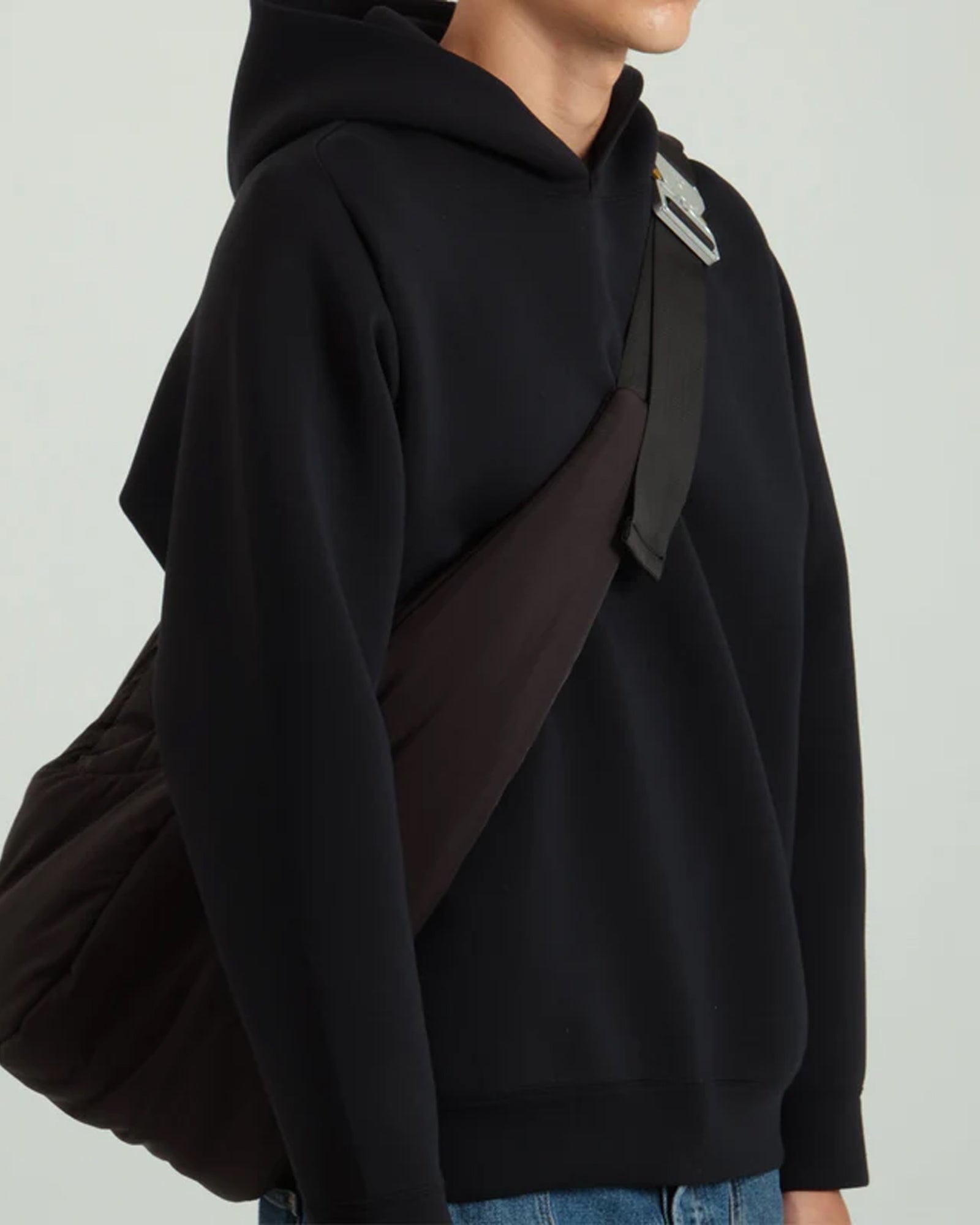 A Eckhaus Latta Shirt pictured on a model in front of a white background. The title of the product is Eckhaus Latta Eclipse Turtleneck - Stone and the image was taken by 199A®.