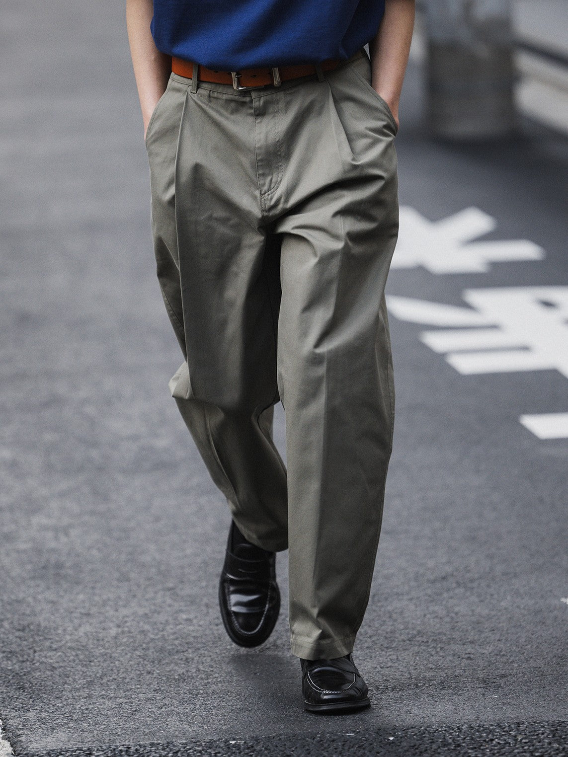 A Eckhaus Latta Shirt pictured on a model in front of a white background. The title of the product is Eckhaus Latta Eclipse Turtleneck - Stone and the image was taken by 199A®.